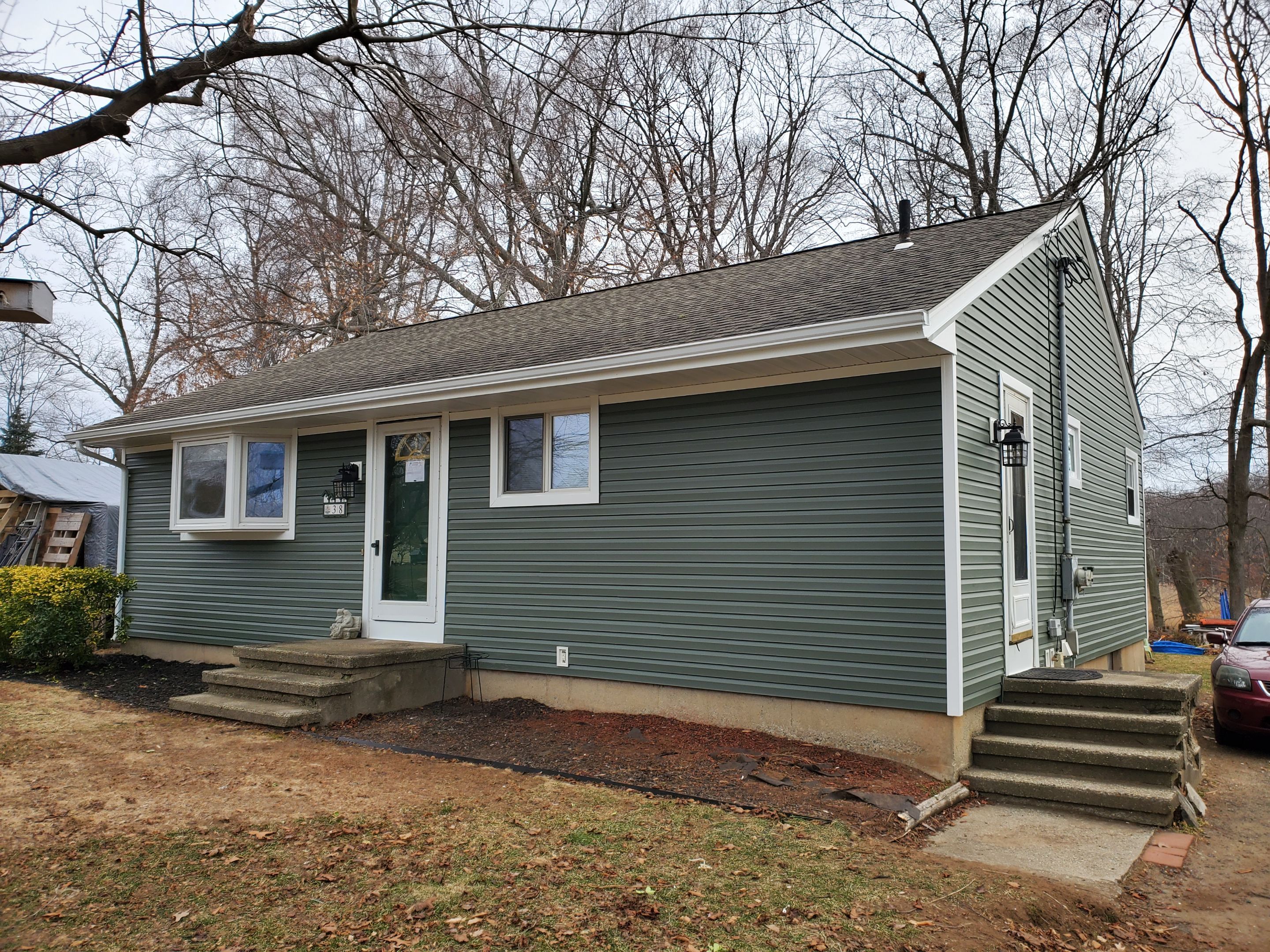 Siding Installation using Certainteed Mainstreet Forest Green by A Plus Exterior