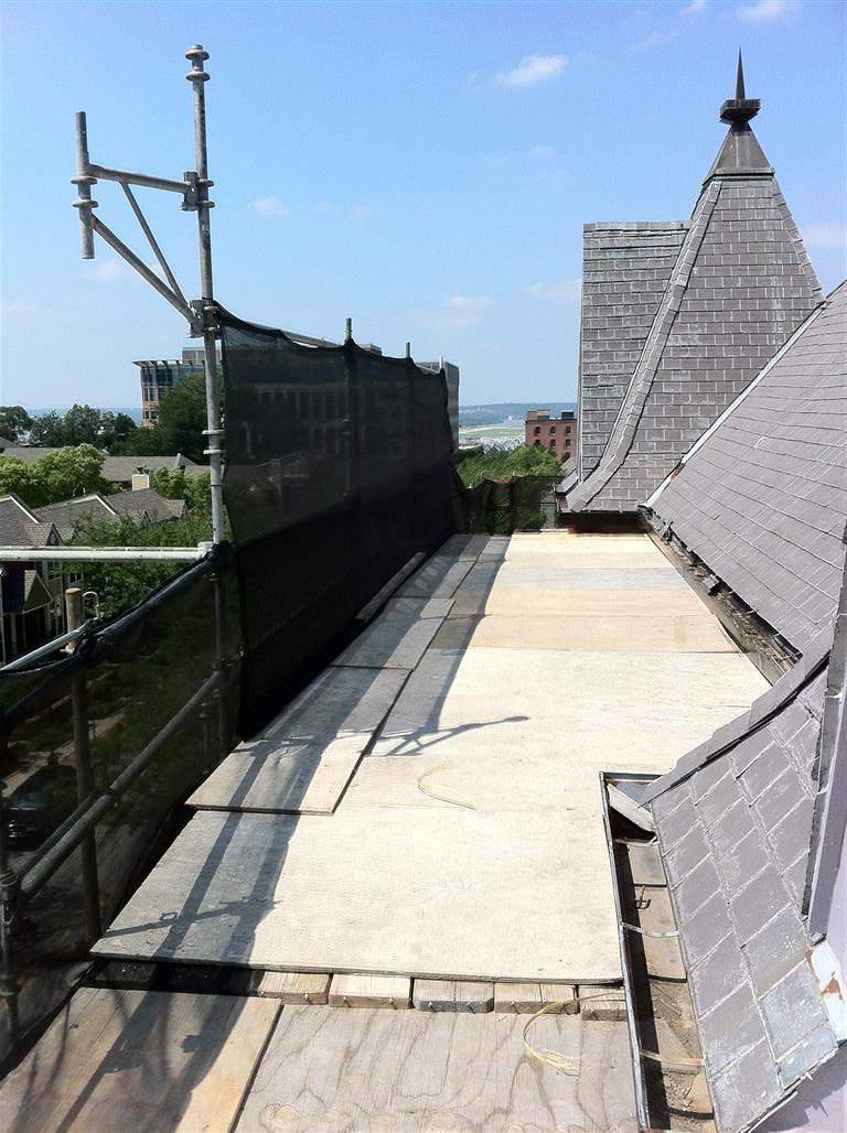 Historic Building ROOF REPLACEMNT with GAF TruSlate  on steep slop and Versico 60mil TPO on flat roof by Gorilla Exteriors Contracting, LLC