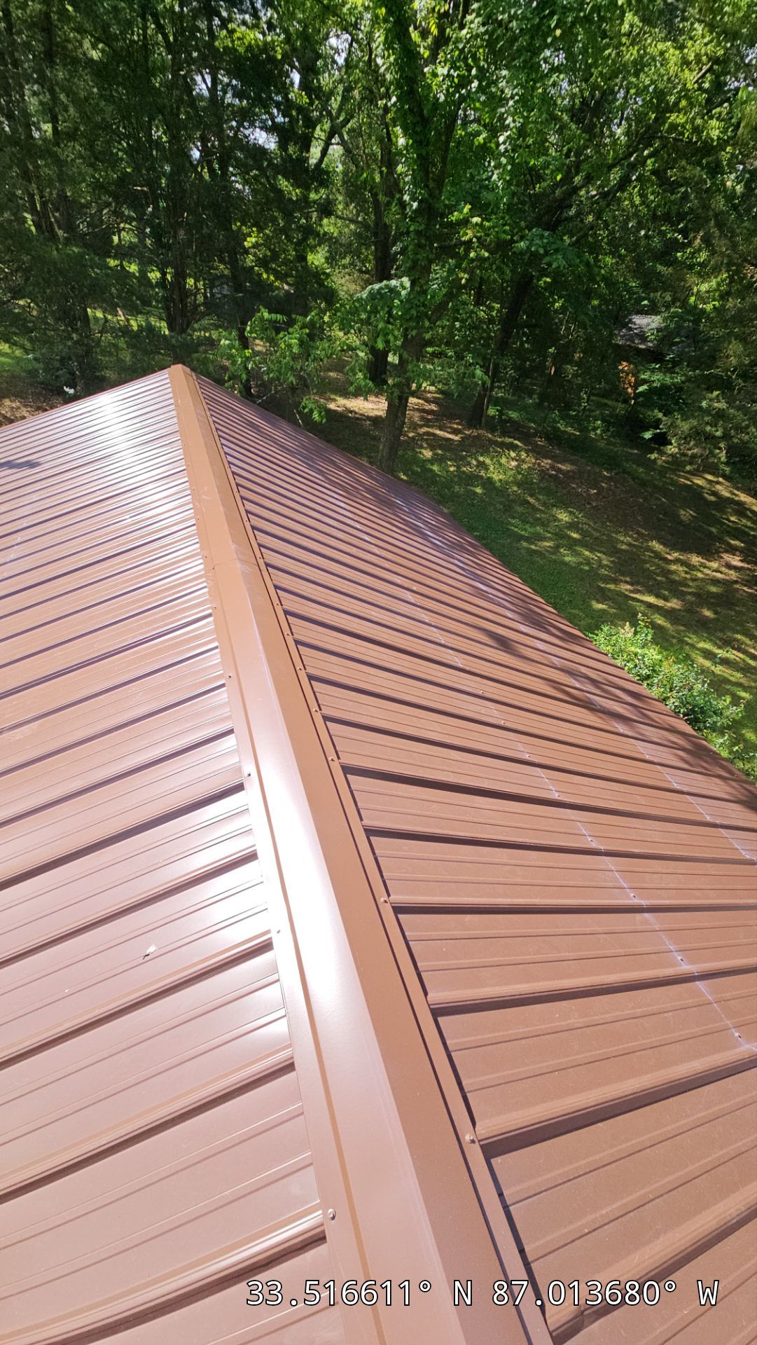 Metal Roof Replacement in Sylvan Springs (Brown) by The Roofing Dudes