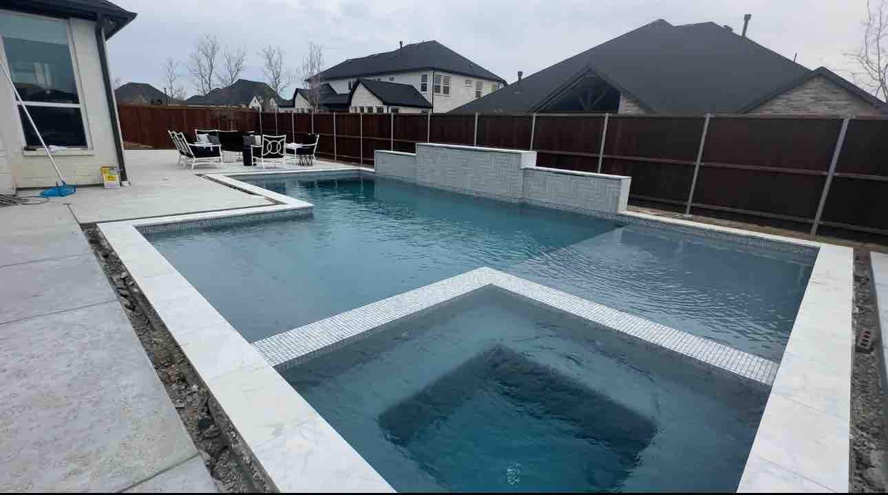 Pool with Large Sun Shelf and Spa by Pinnacle Pools and Spas - DFW