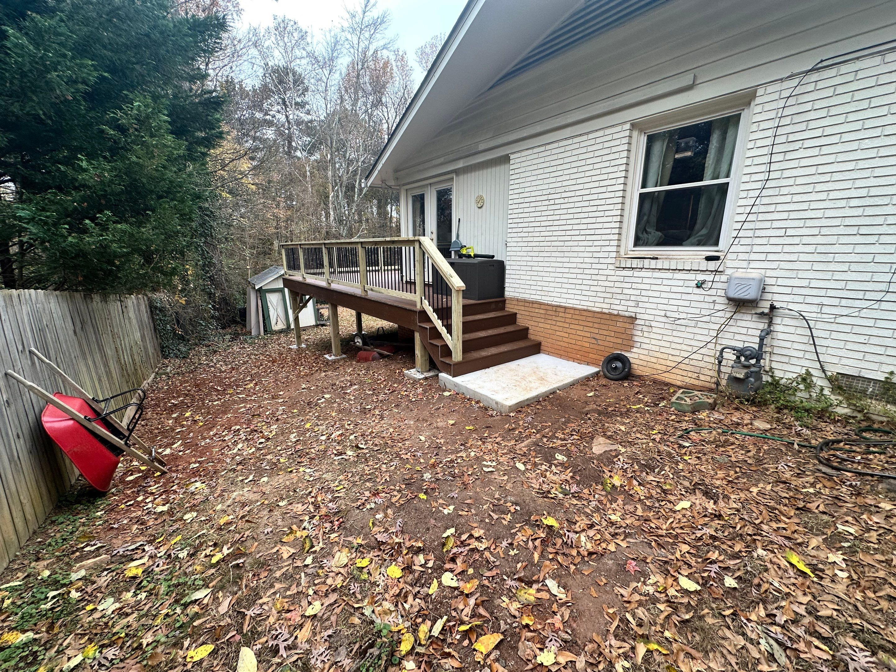 Elevated Composite Deck Rebuild With Metal Balusters in Marietta by Swift Home Renovations