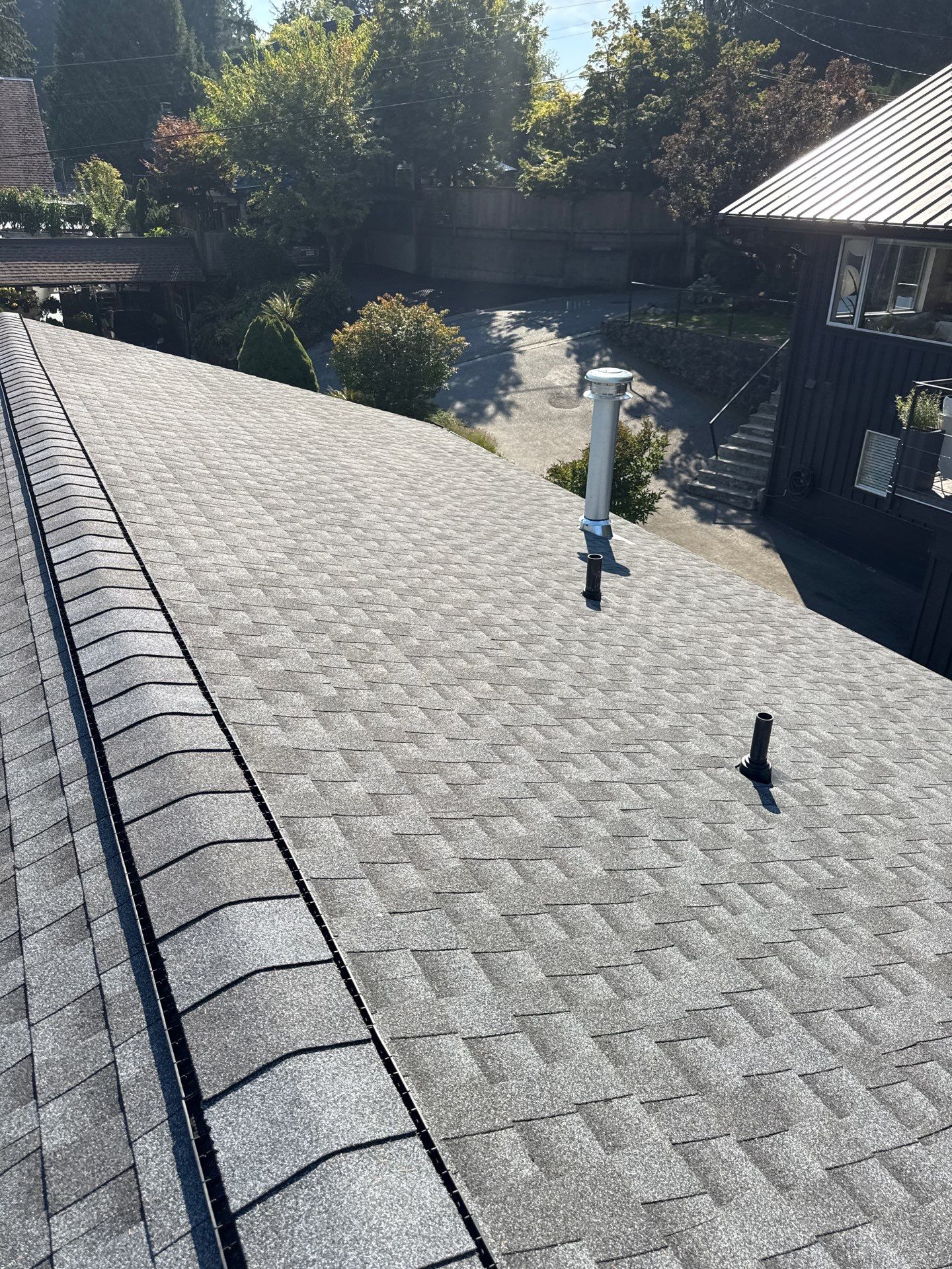 Residential Re-Roof using GAF Timberline HDZ Pewter Grey by Top Notch Roofing Inc
