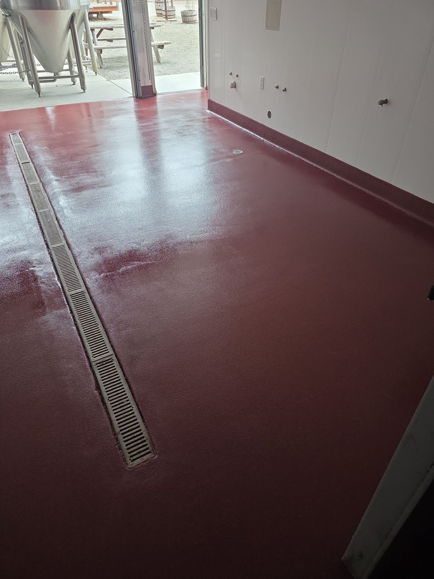 Industrial Red Quartz Polyurea Floor Installation for Atascadero Brewery by MGP Coatings