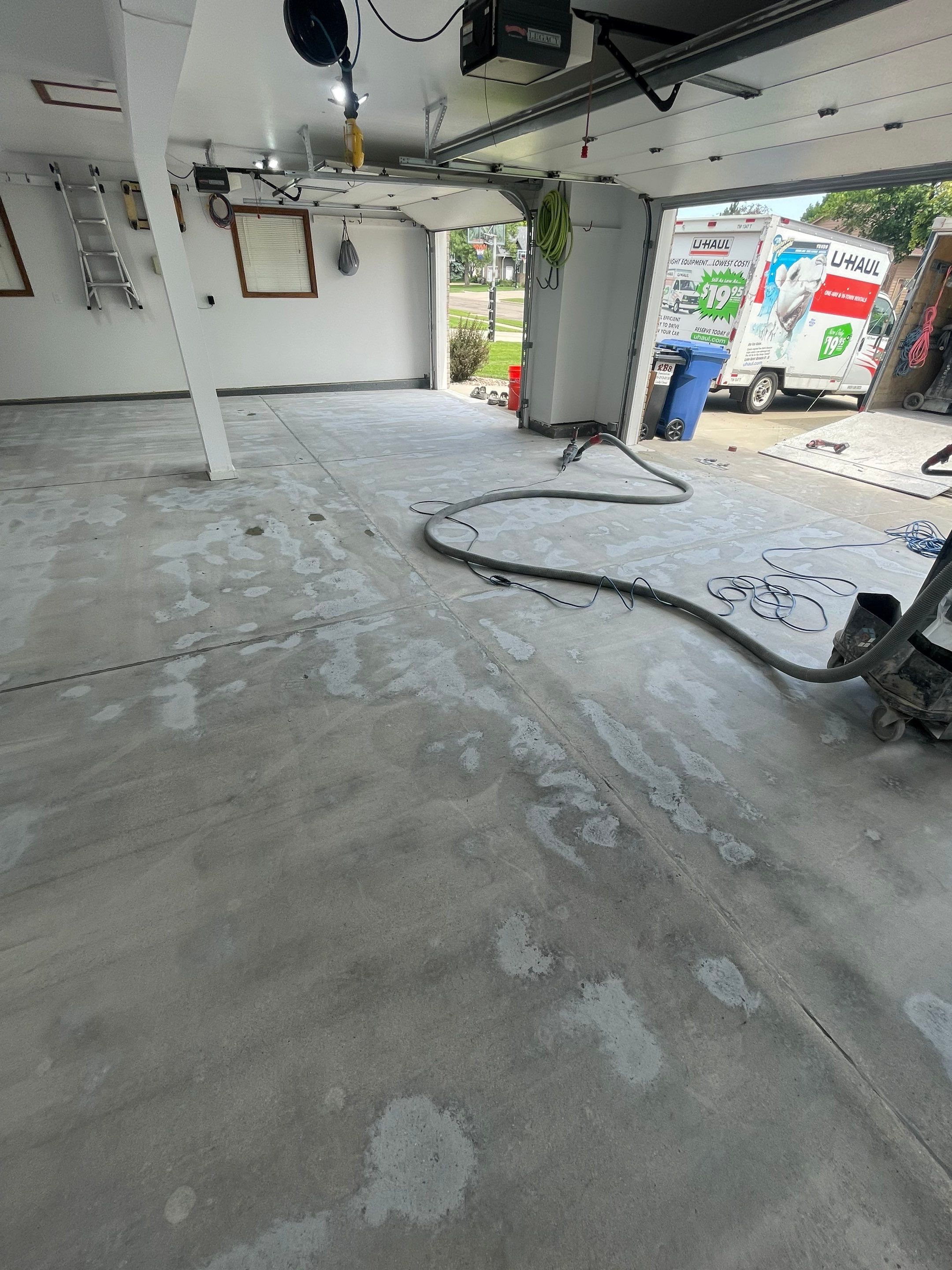 Multi-Car Garage Concrete Coating with Coyote Flake Finish in Sioux Falls by Select Painting, Coatings & Garage Cabinets