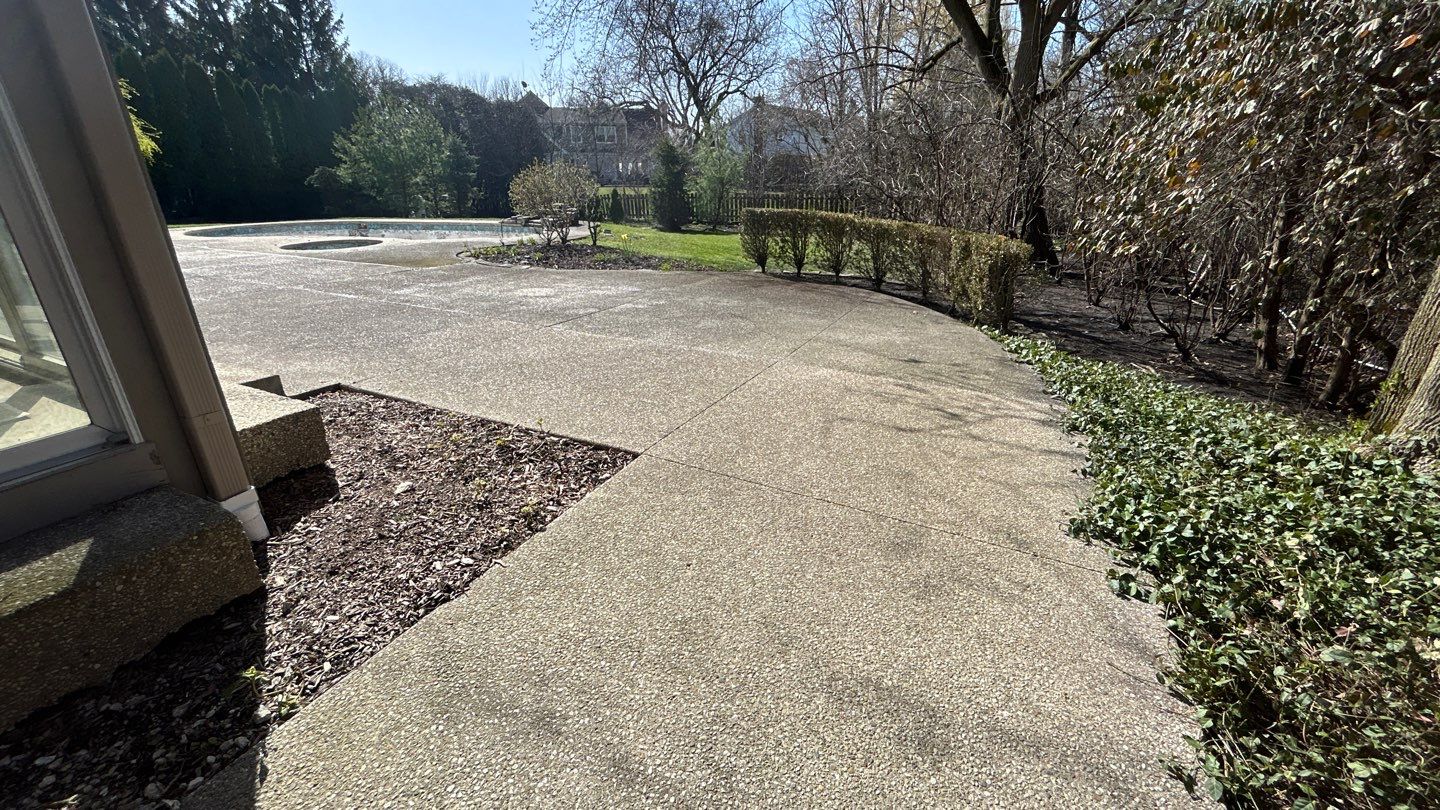 Aggregate Clean and seal using low gloss sealer by Northern Power Washing LLC.