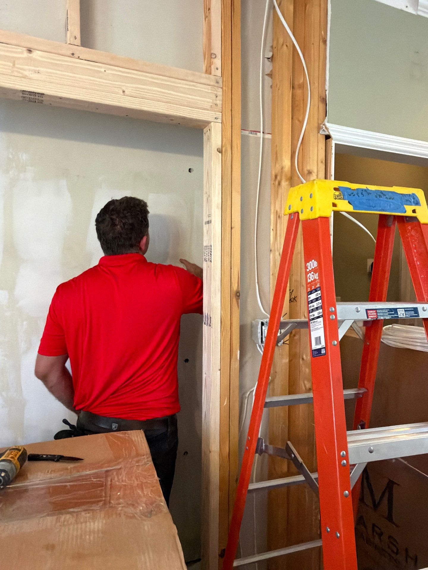 Complete Kitchen Renovation Featuring White Shaker Cabinetry in Fayetteville by Karcher Roofing & Construction