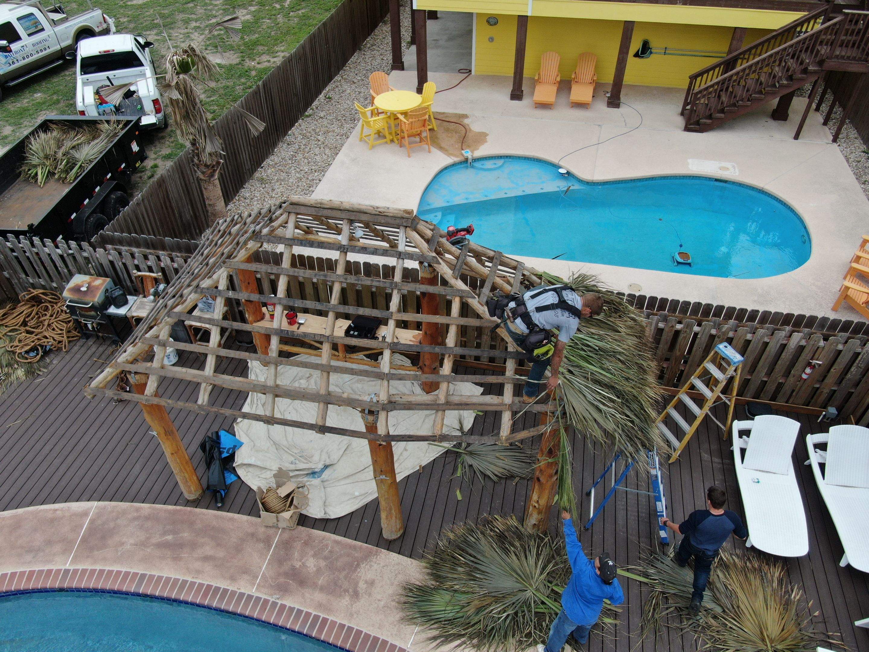 Poolside paradise by Bayfront Roofing and Construction