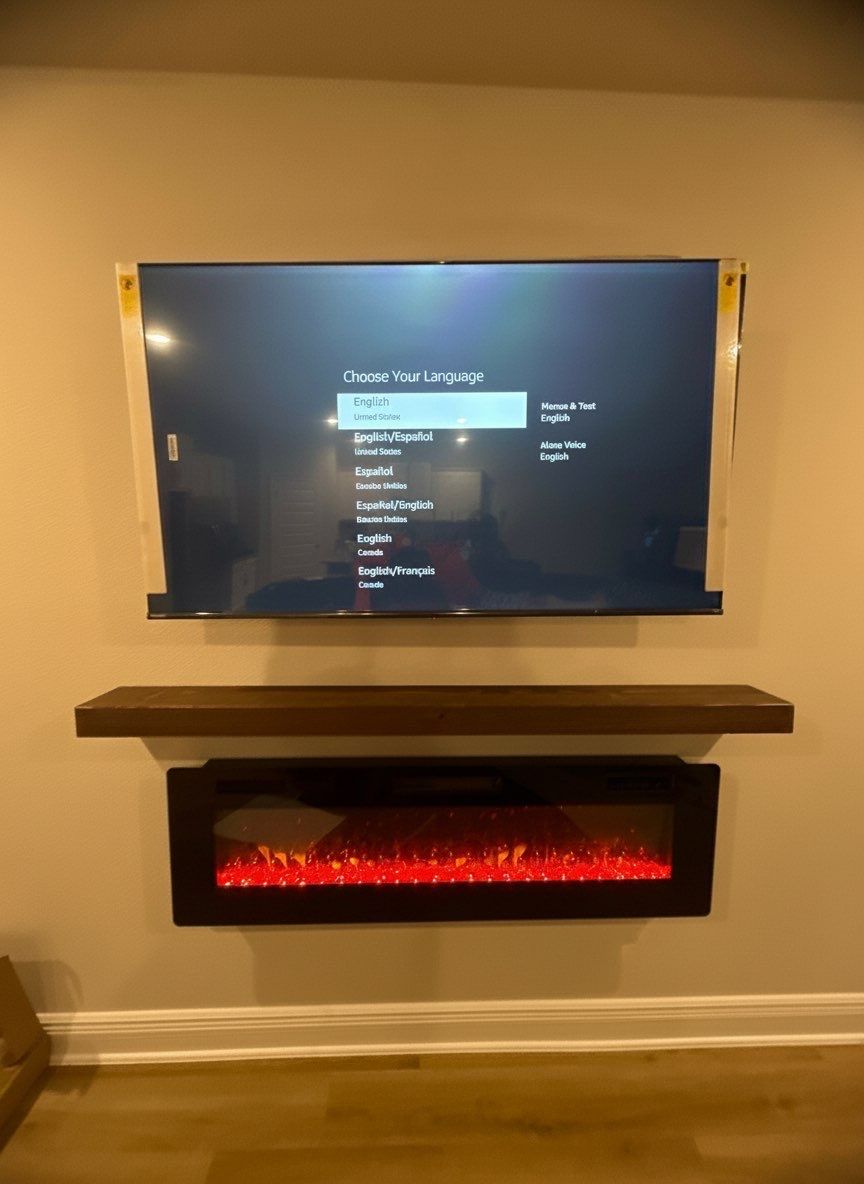 Floating Furniture, Fireplace Mantel, & Electric Fireplace Installation Projects by Hangman Mounting & Installation 