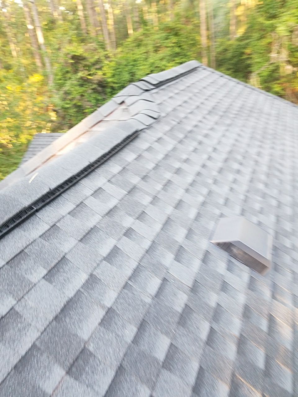 Residential Roofing Installation using Roof Replacement by American Roofing & Construction LLC