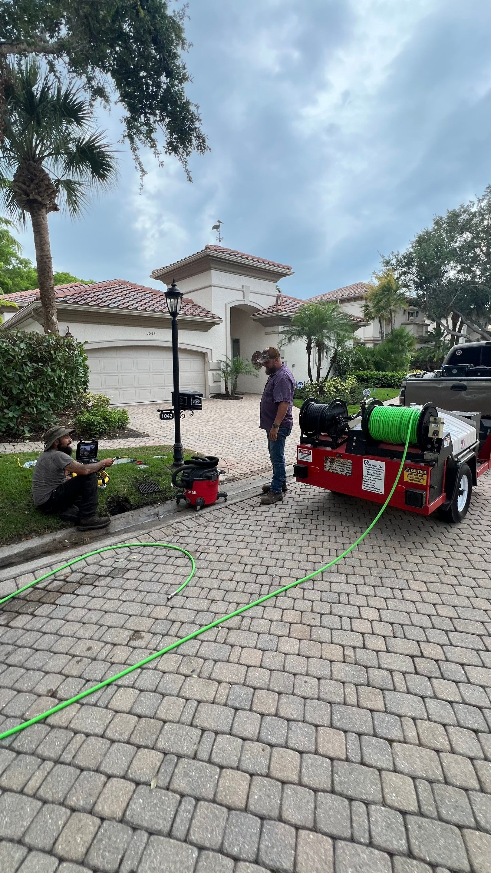 Residential Stormwater Gutter Drain System Maintenance by APS Power & Water