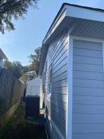 Siding Installation using JH Select Cedarmill Eased Edge by ExteriorPros