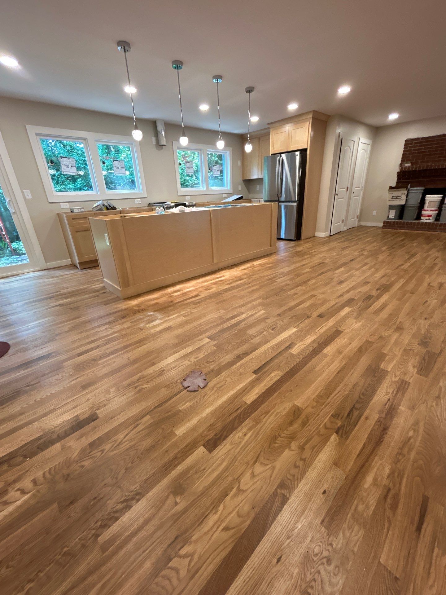 Remodel with existing and new white oak by Footprints Floors of East Atlanta
