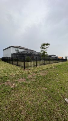 Aluminum Fence Installation using Black 3 Rail Aluminum Fence