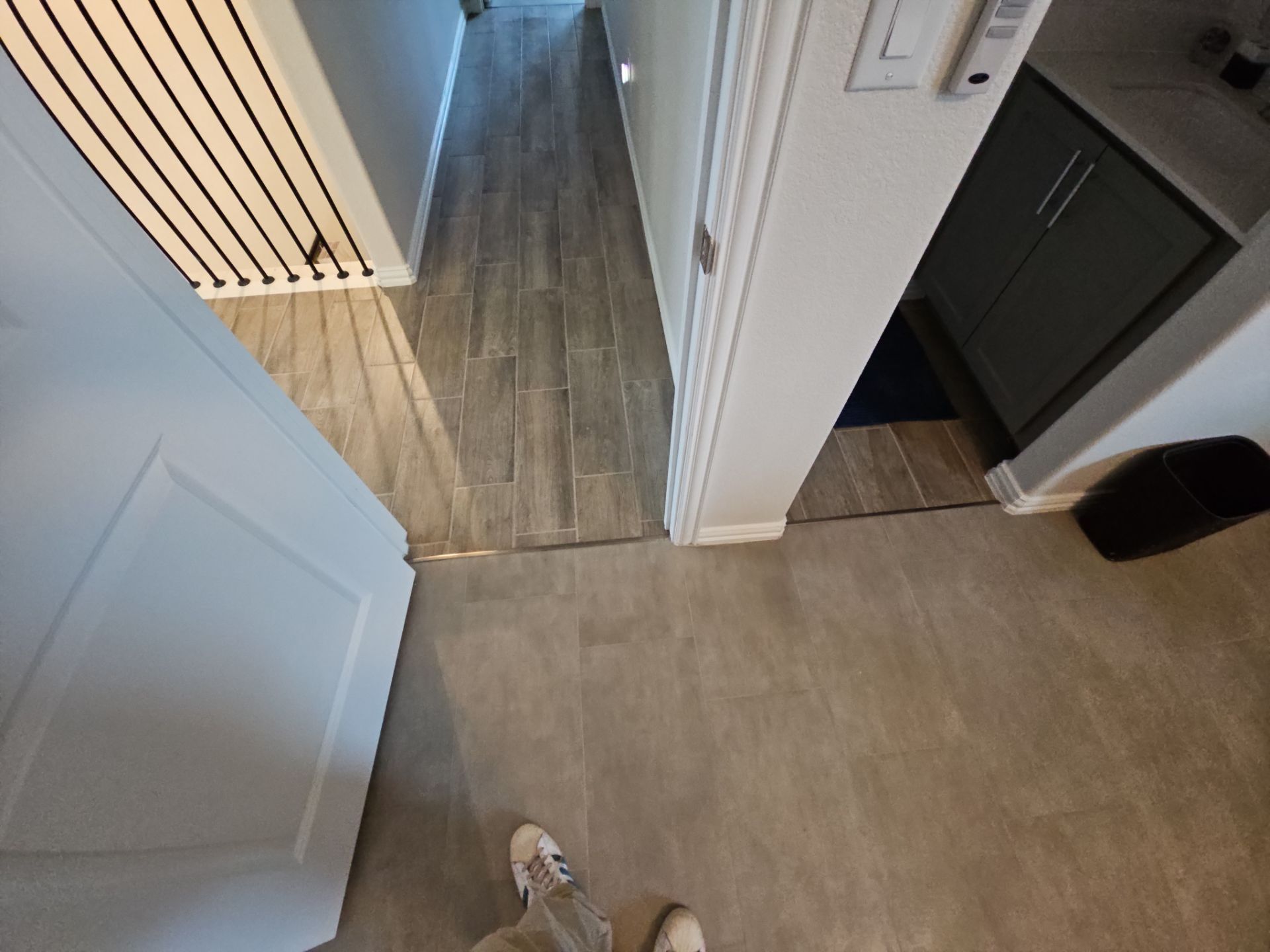 Carpet replacement with Tile and Red Oak Stairs by EL-GC LLC 