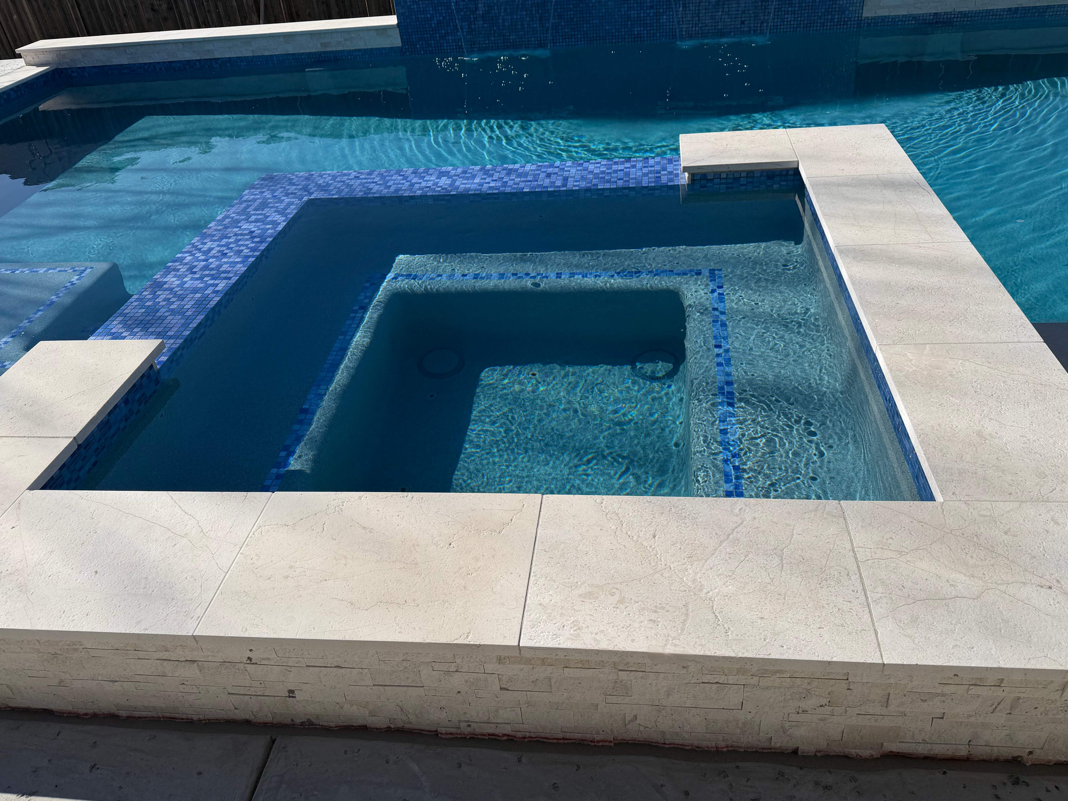 Geometric Pool with Raised Spa and Tanning Ledge by Pinnacle Pools and Spas - DFW