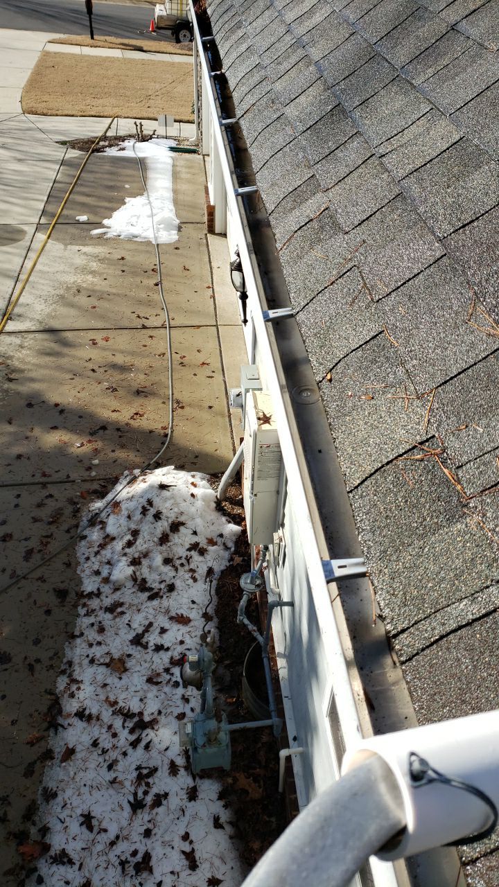 Gutter Cleaning using water by G&H Home Tech Pros LLC