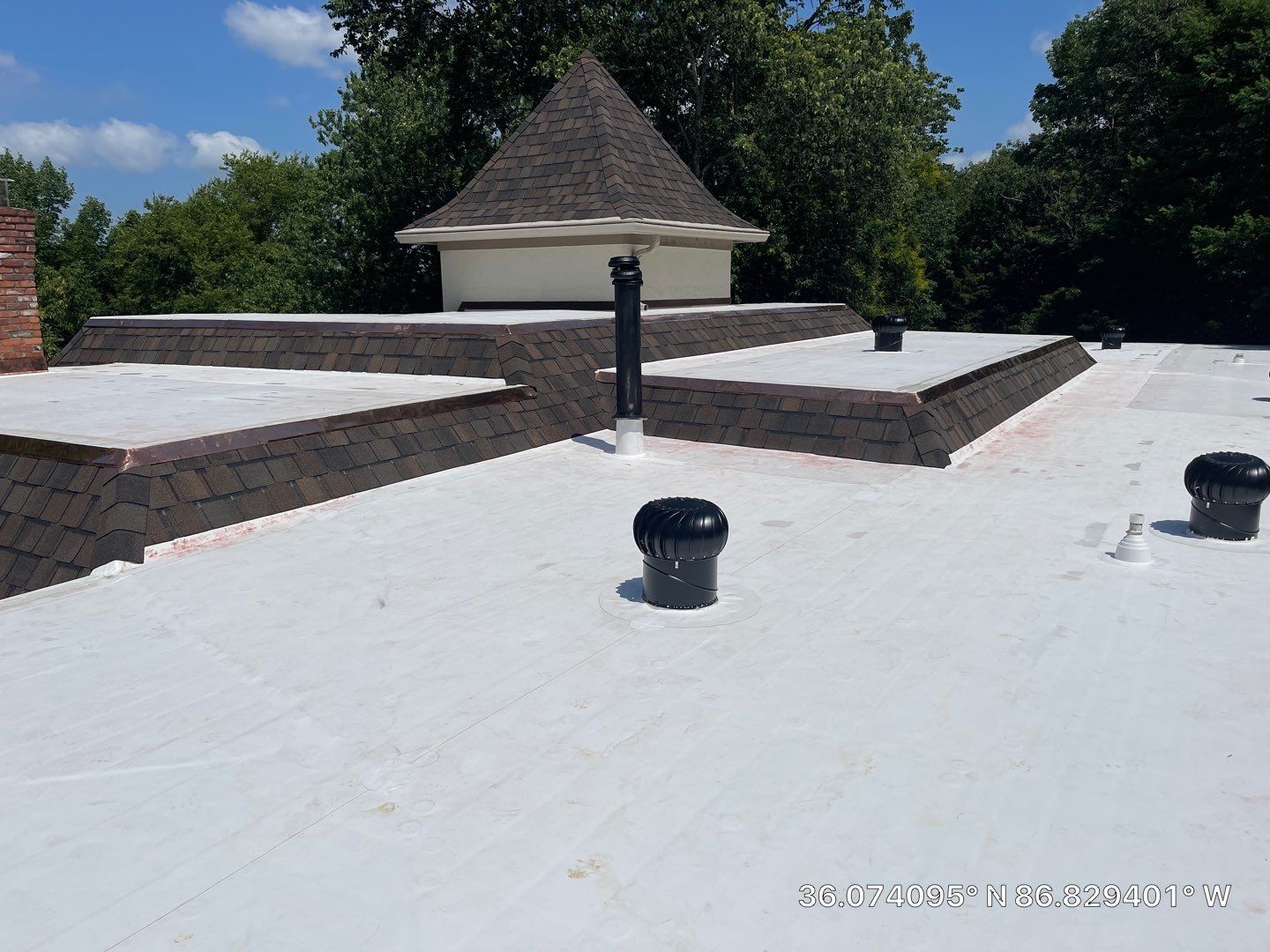Residential Roofing Installation using Certainteed Belmont Shingles and TPO by Undersun Roofing 