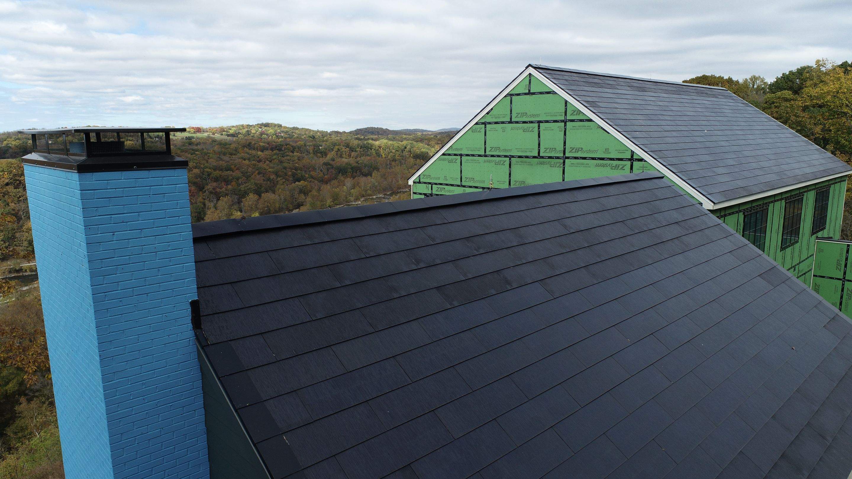 Roof Installation using Tesla Solar Roof V3 by American Home Contractors