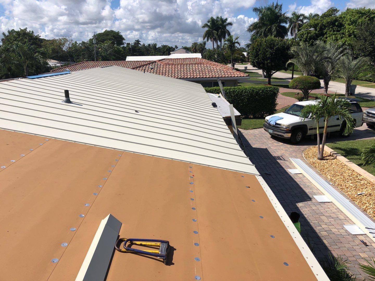 Residential Roofing Installation using 1" Nail strip metal roof by BLUES BROTHERS ROOFING