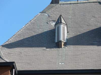 Historic Building ROOF REPLACEMNT with GAF TruSlate  on steep slop and Versico 60mil TPO on flat roof