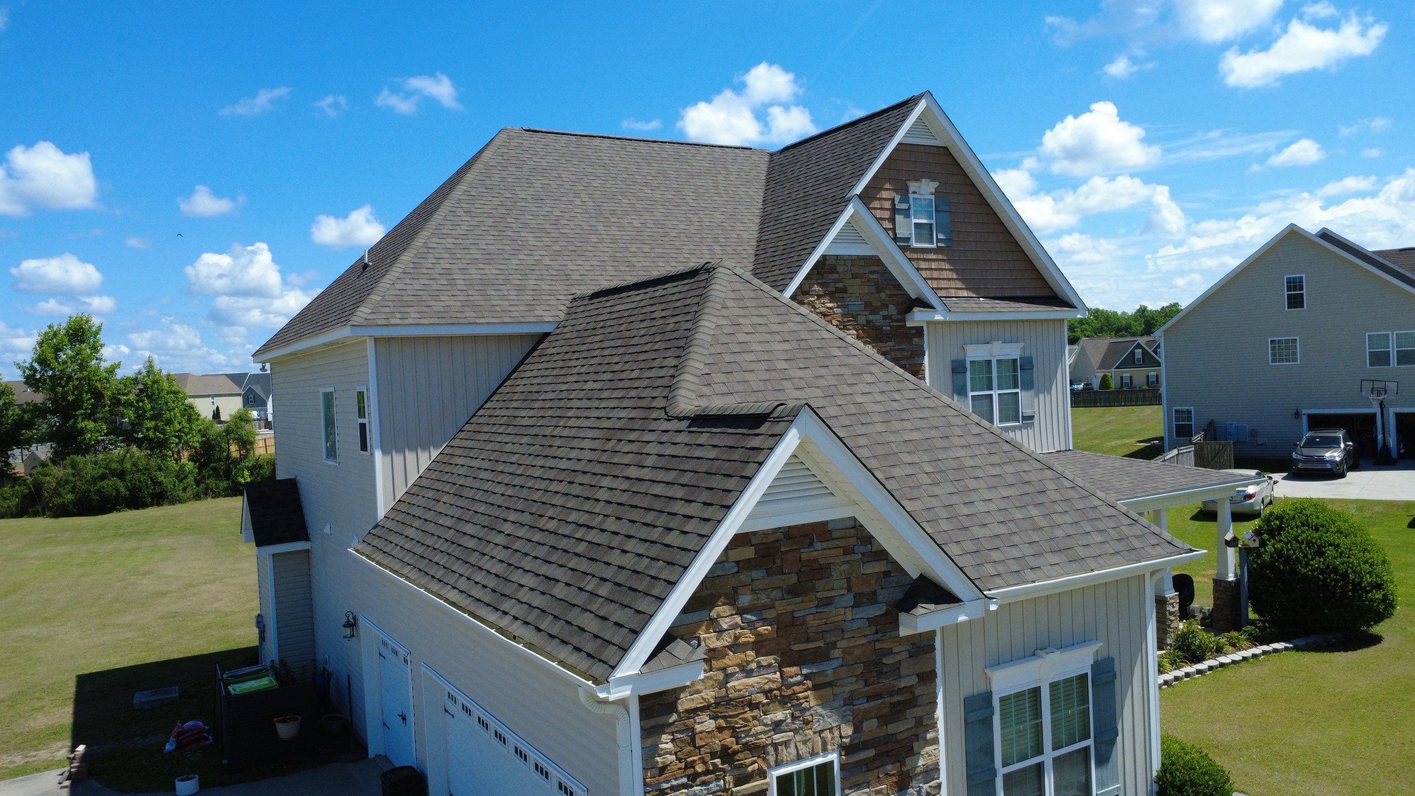 Roof Replacement in Jacksonville, NC using Landmark Weathered Wood by RGR Construction and Roofing, LLC