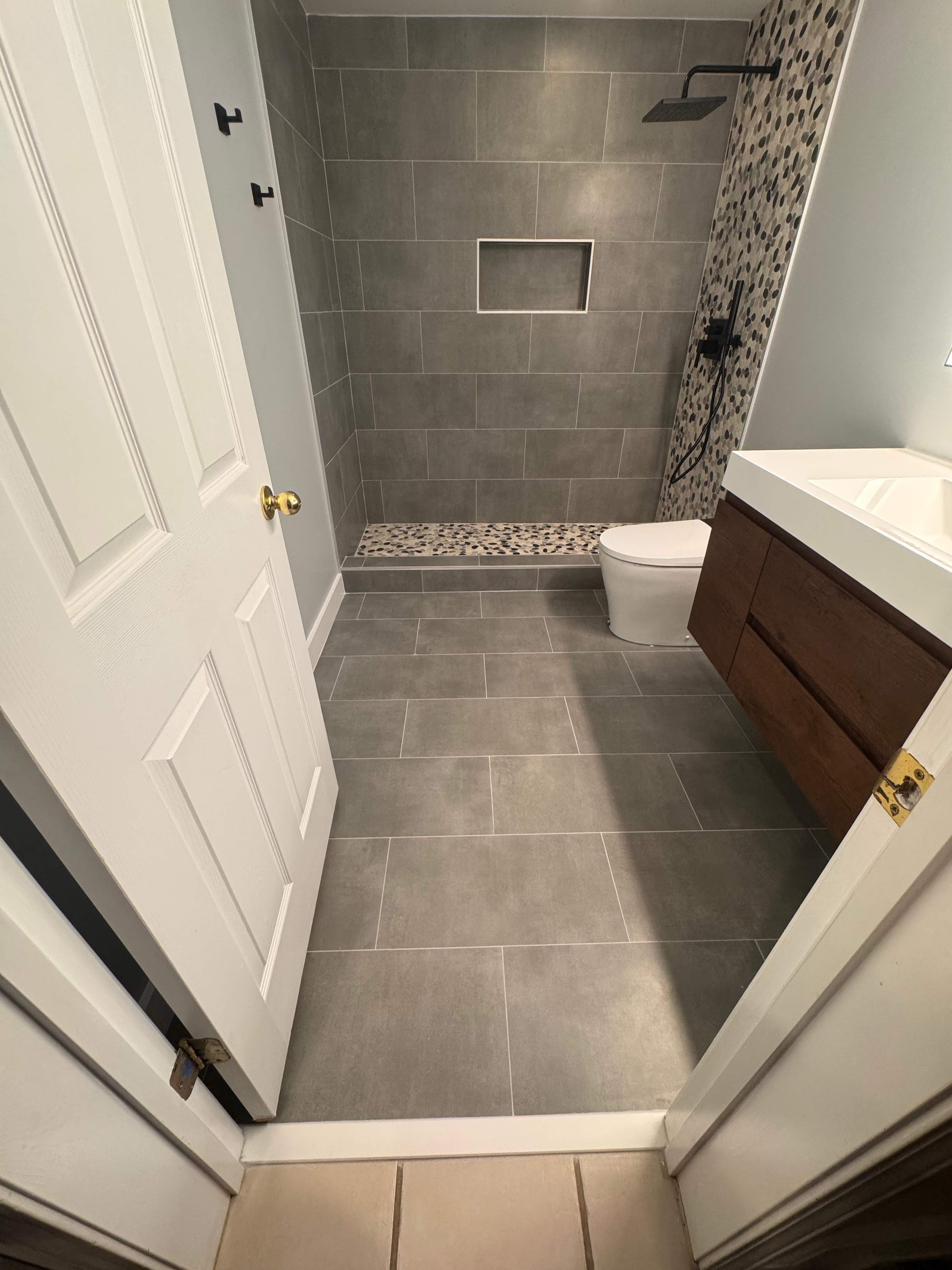 Basement bathroom renovation by Prudencio