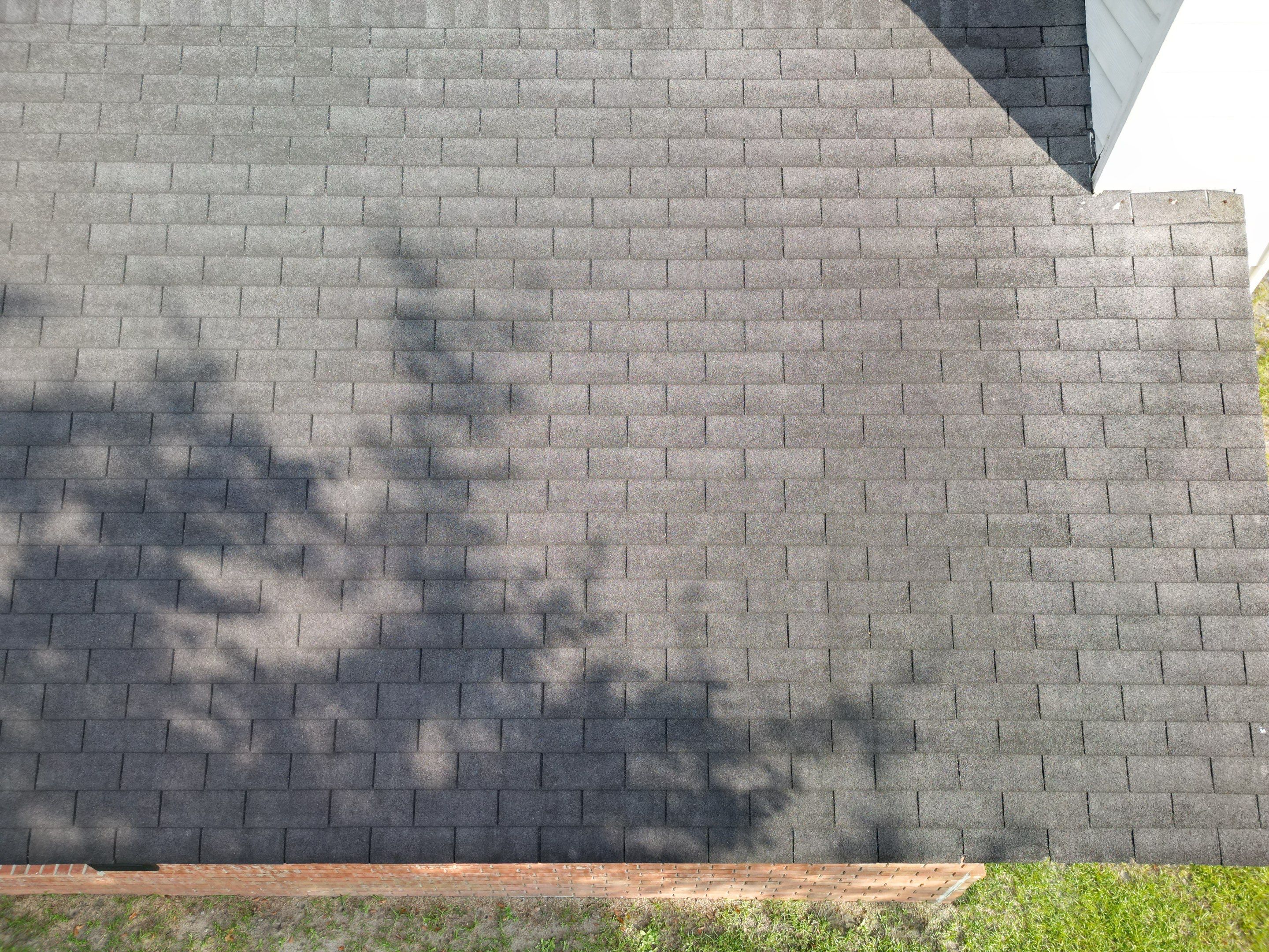Residential Roofing Installation using Benton 26Ga 1inc Snapcock Metal Roof KYNAR Matte Black by Talya Roofing