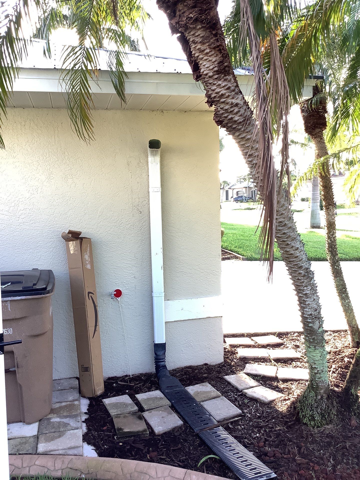 Downspout Installation using 3X4 Elbow Downspout in Cape Coral by Gutter Professors