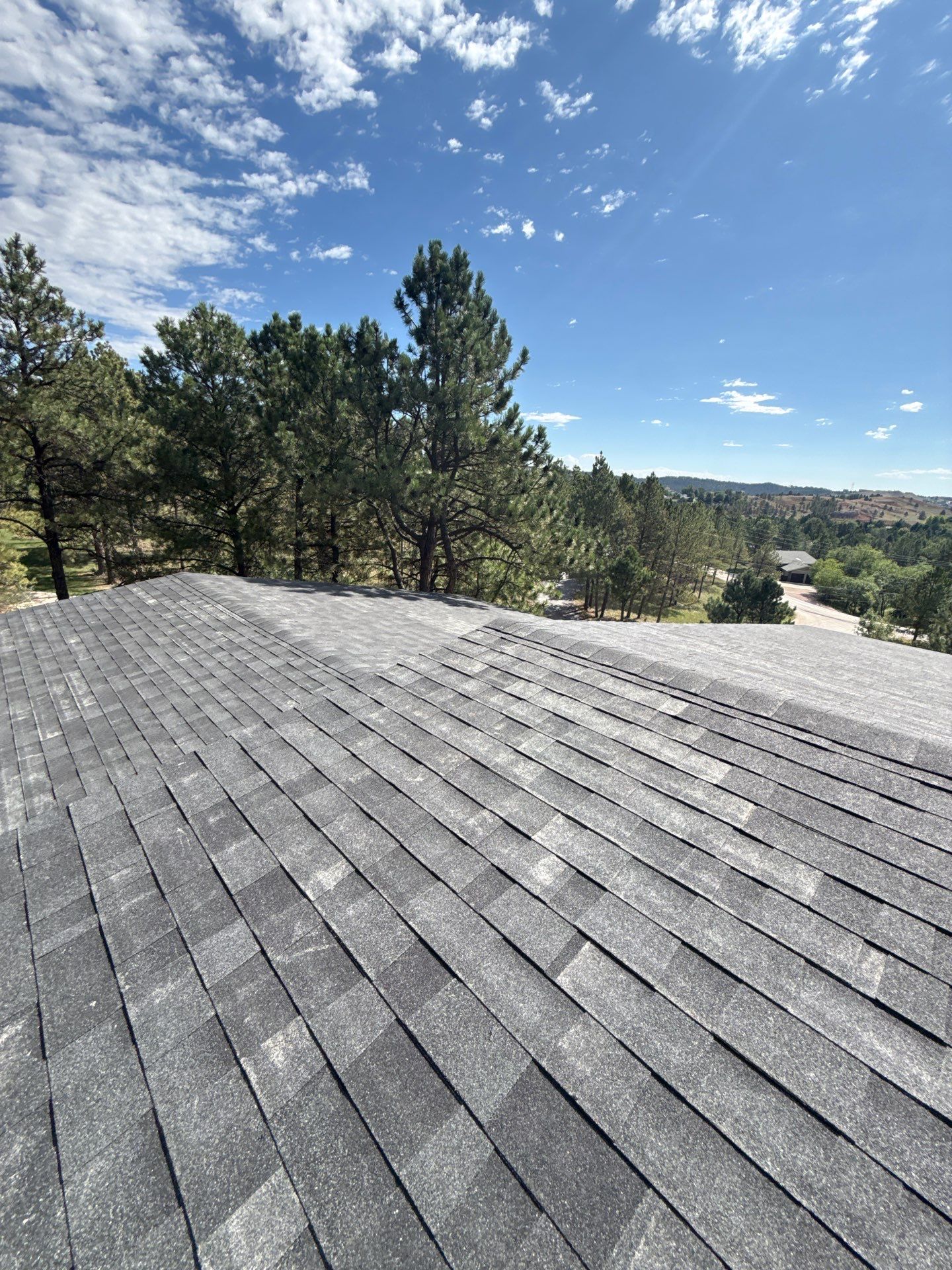 Full Architectural Shingle Installation for Contemporary Rapid City Residence by Weather-Tite Exteriors LLC