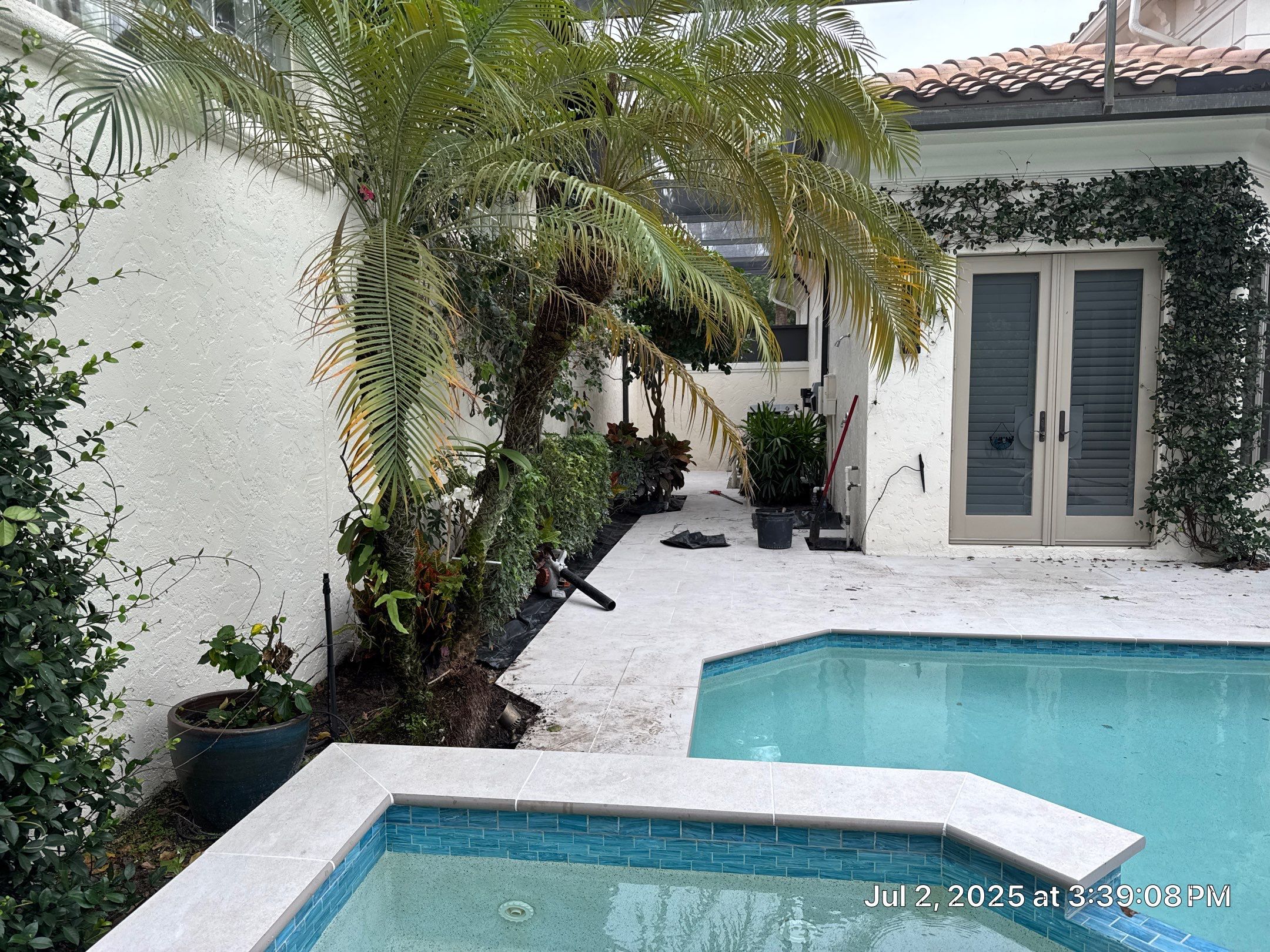 Pool Deck/Landscape/landscape lighting/pool coping/porcelain pavers/Pelican Marsh by Old Town Pavers Llc