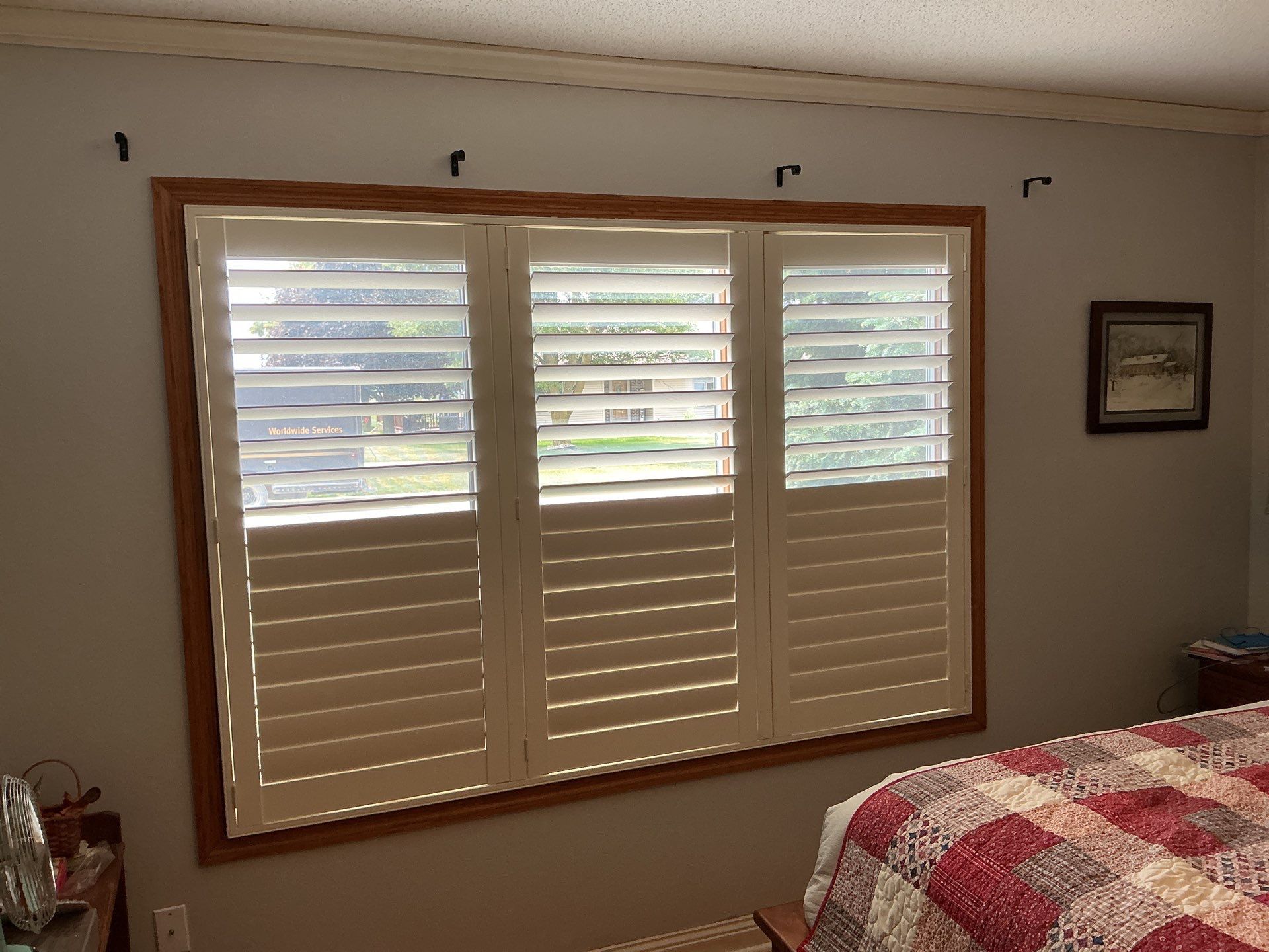 Cozy Bedroom Gets New Shutters by tracy.hickman@budgetblinds.com