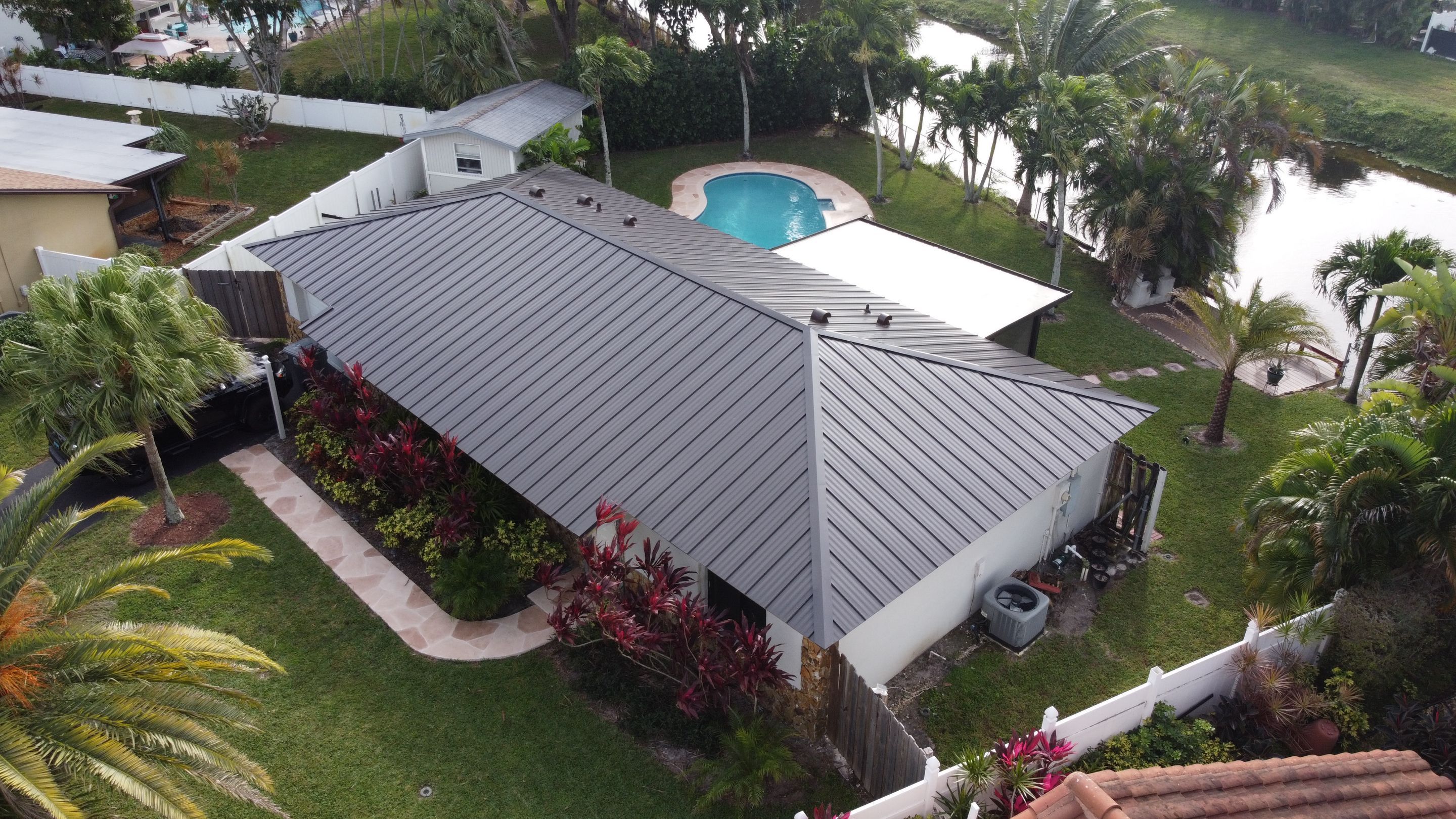 Residential Roofing Installation using 1" Nail strip metal roof by BLUES BROTHERS CONSTRUCTION CORP
