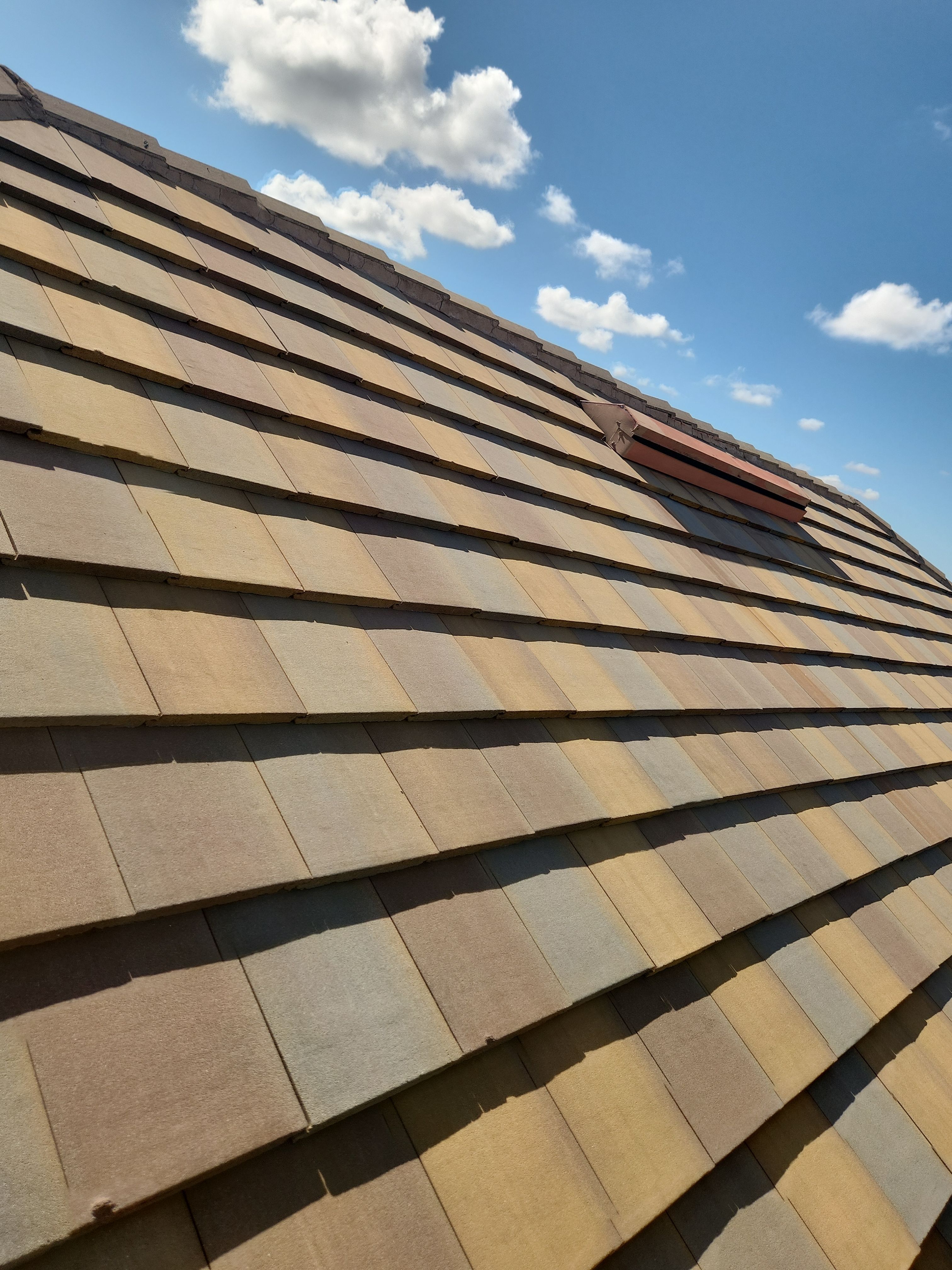 Concrete Tile Roof Repair for Residential Home in Wellington by Aastro Roofing