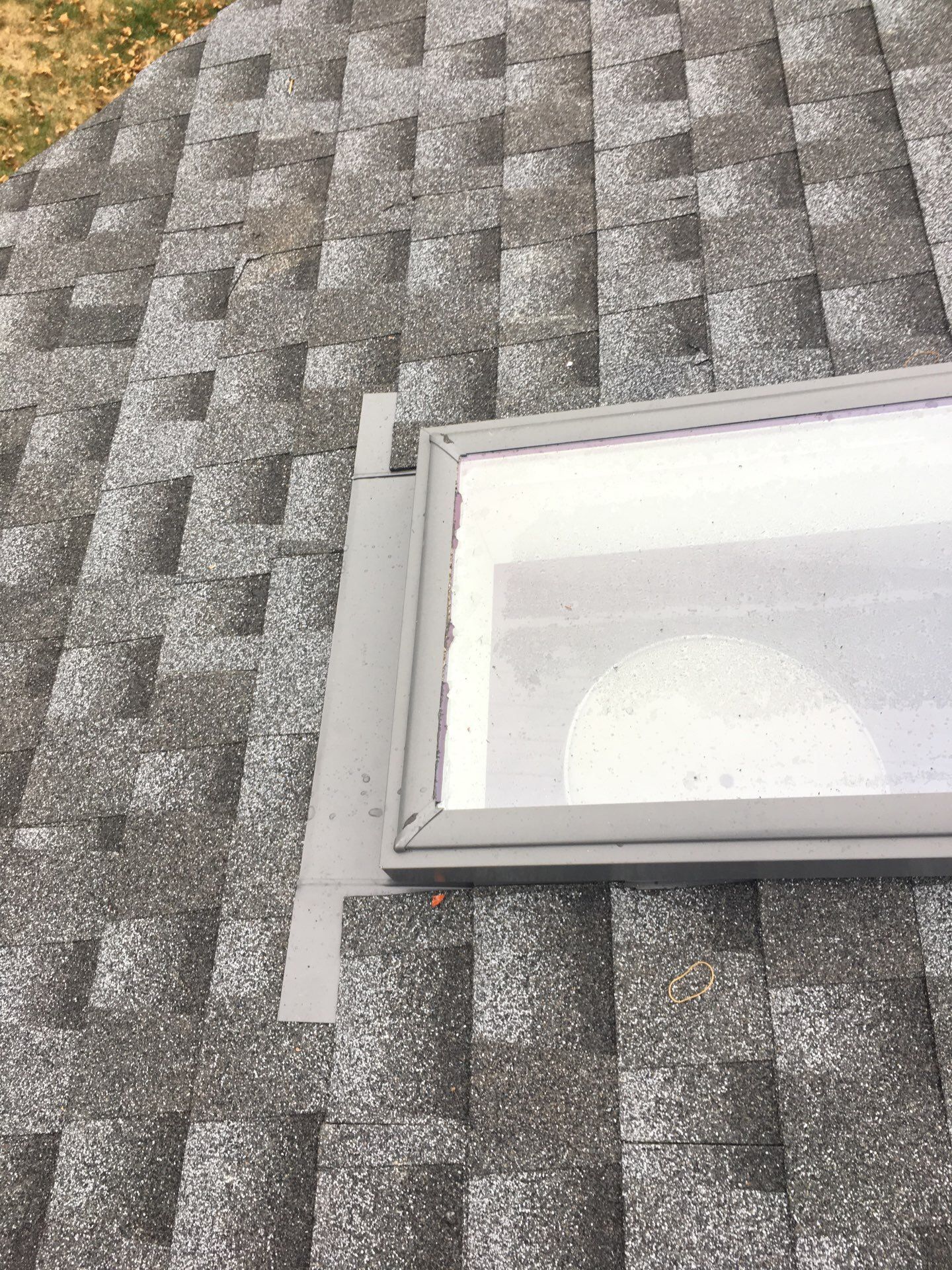 Roof and Skylight Replacement by American Home Contractors