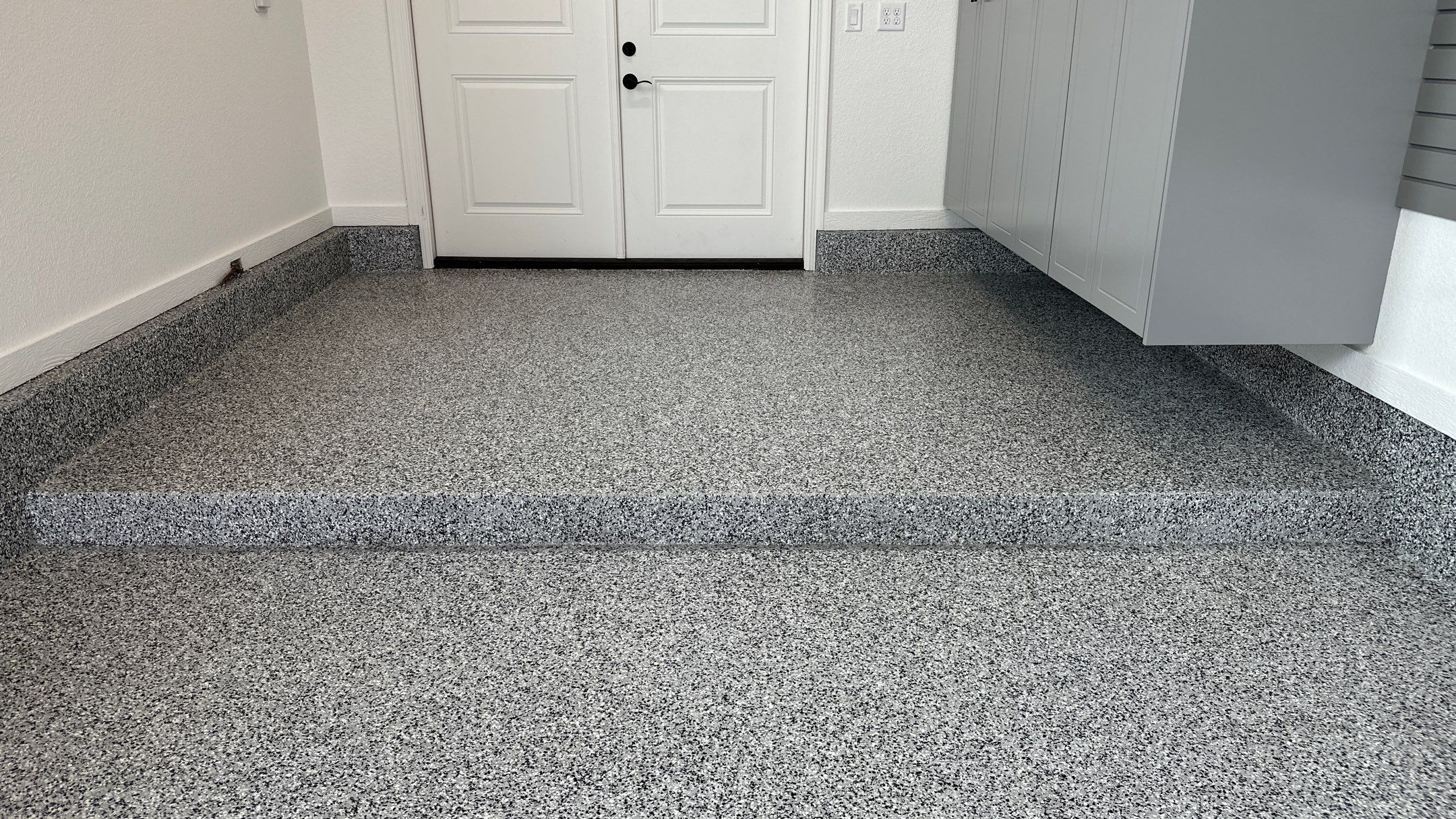 Mike & Pam transformed their garage with a Banner Garage Floor and Cabinets by Banner Garage