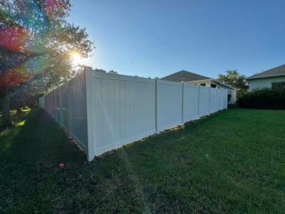 Vinyl Fence Installation using 6Ft White Vinyl Privacy Fence