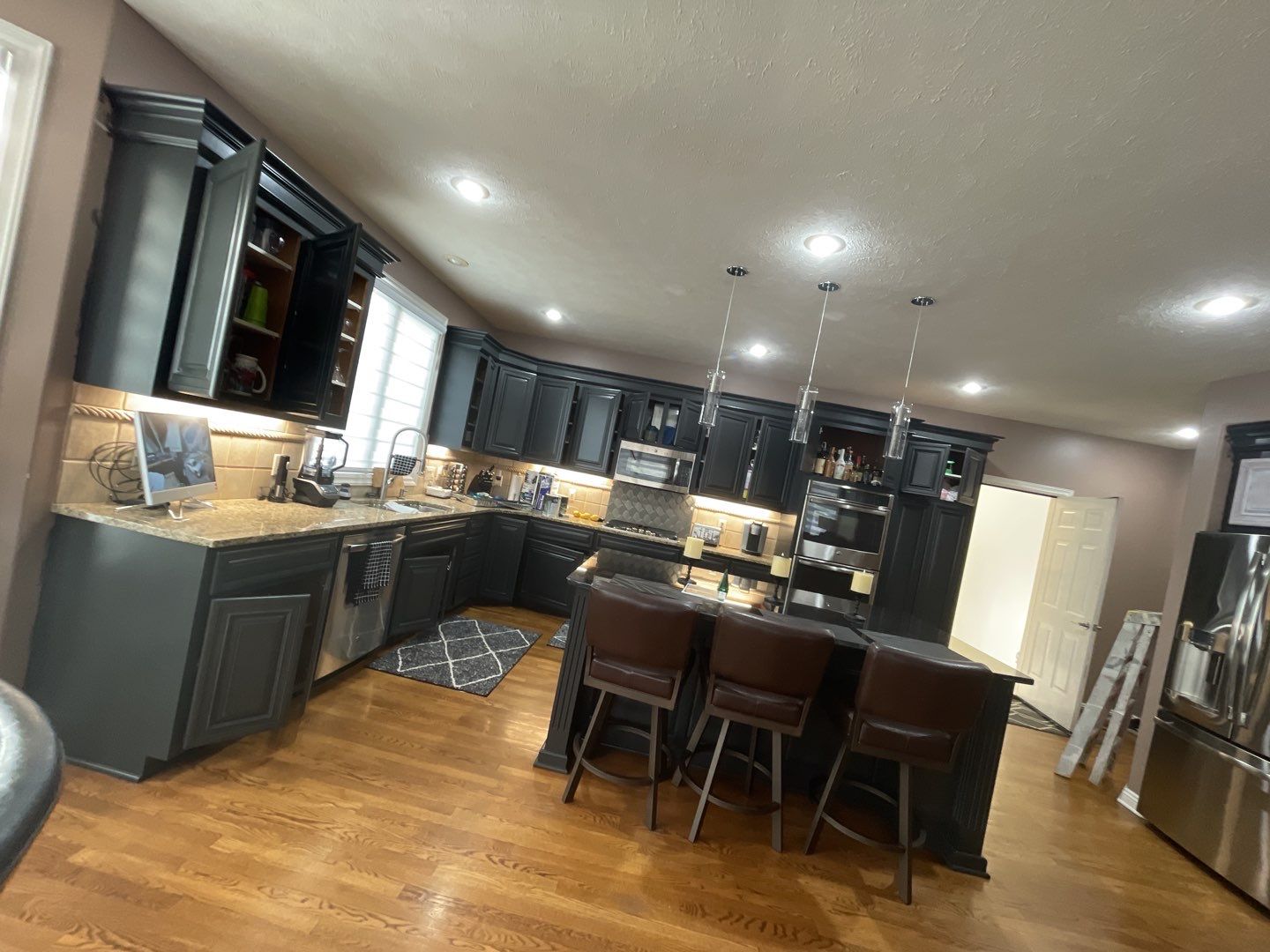 Painting Hardwood using Sherwin Williams paint by Lightning Exteriors