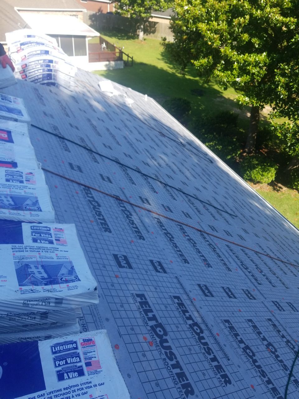 Residential Roofing Installation using Roof Replacement by American Roofing & Construction LLC