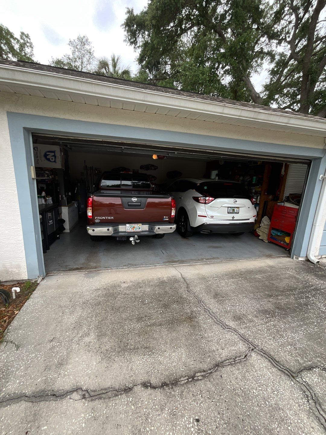 Driveway and Garage using Tidal Wave by Amvet concrete coatings llc
