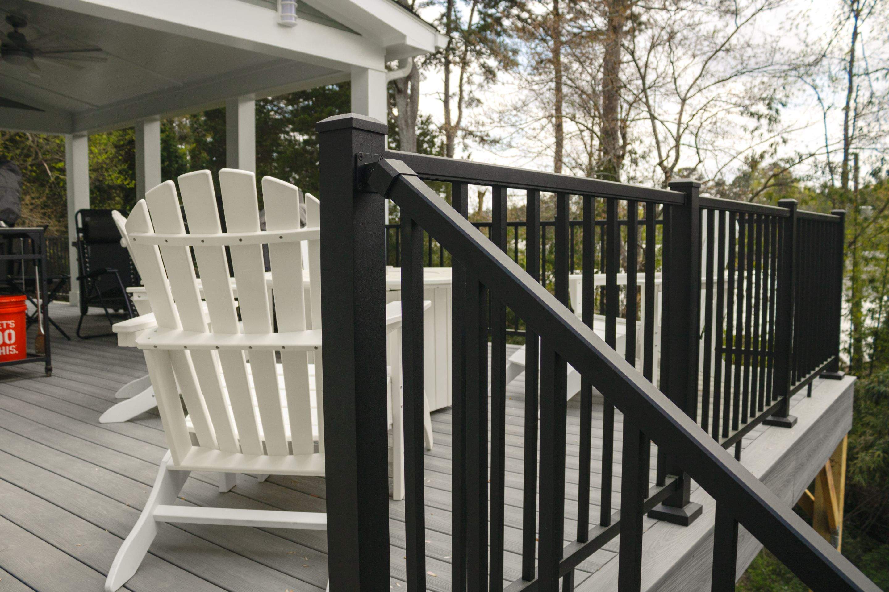Covered Porch and Deck Build using Deckorators Venture Series Decking and Trex Select Aluminum Railing by Nelson Exteriors