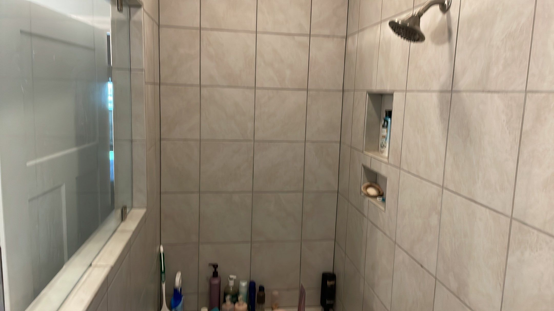 Bathroom Remodel using Decorative Tile by Footprints Floors of Coastal Carolina