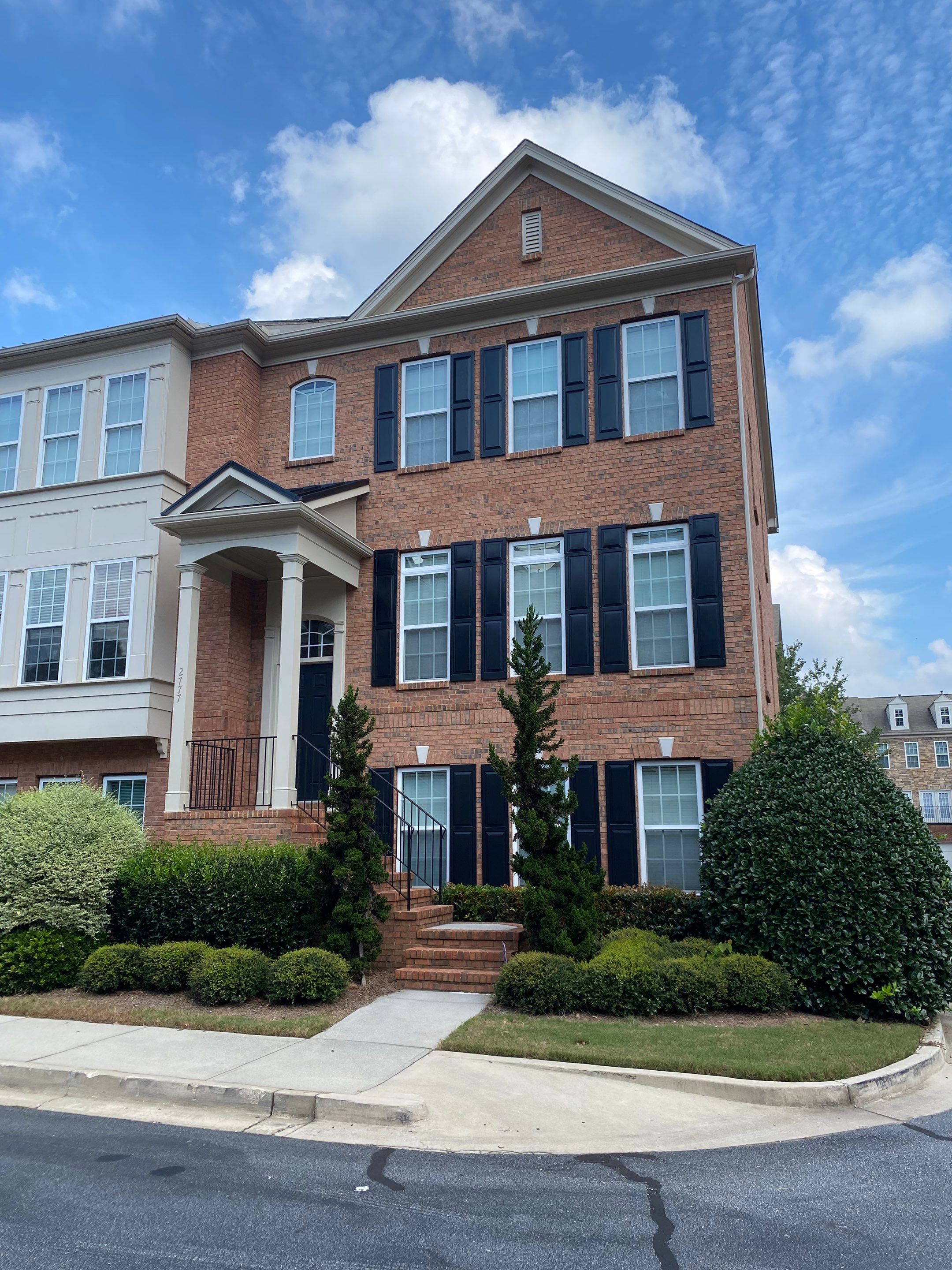 Exterior Trim and Shutter Painting for Atlanta Brick Townhomes by Swift Home Renovations