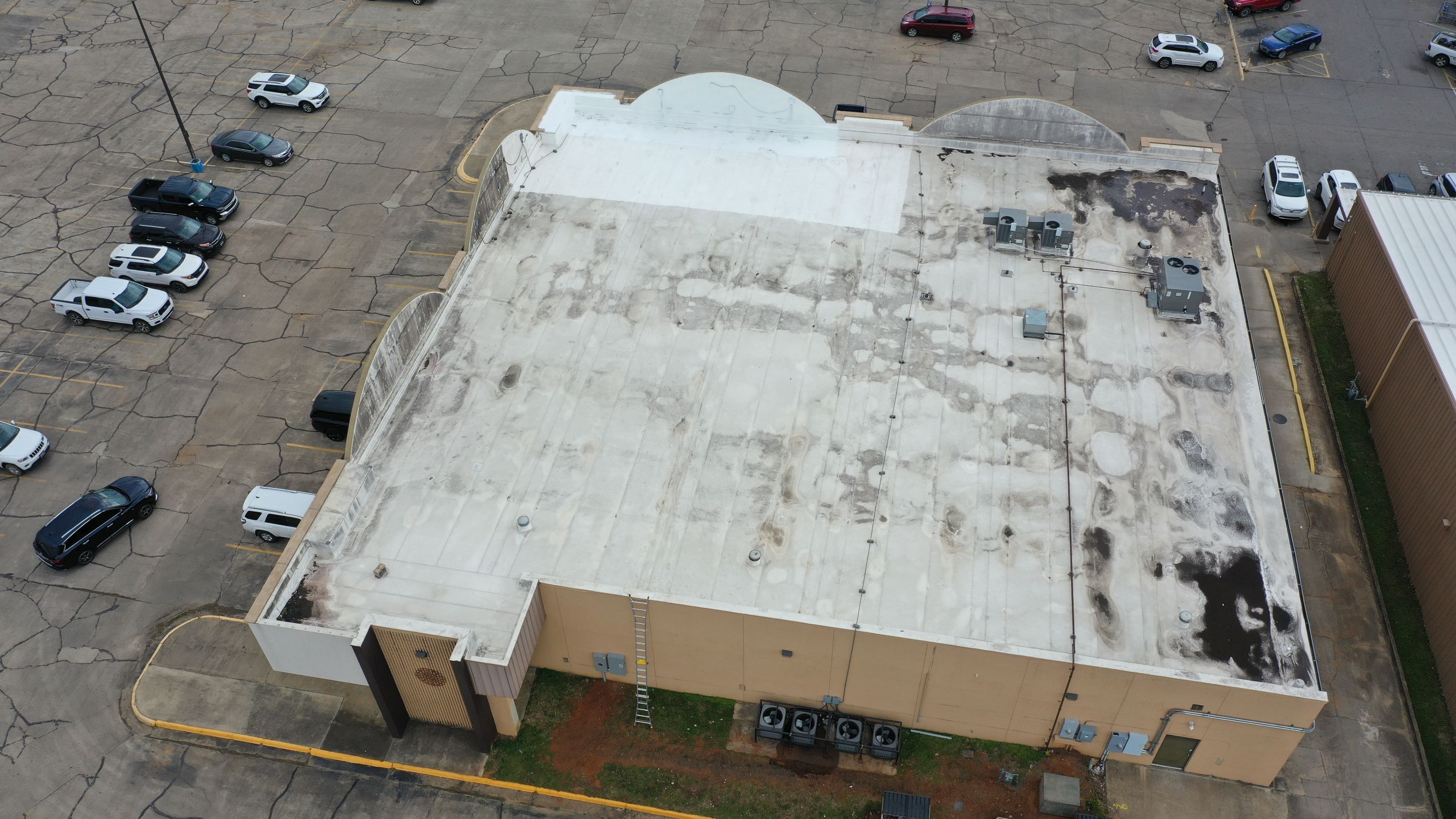 Commercial Roofing Installation using Aldocoat Coatings by Hostetler Roofing