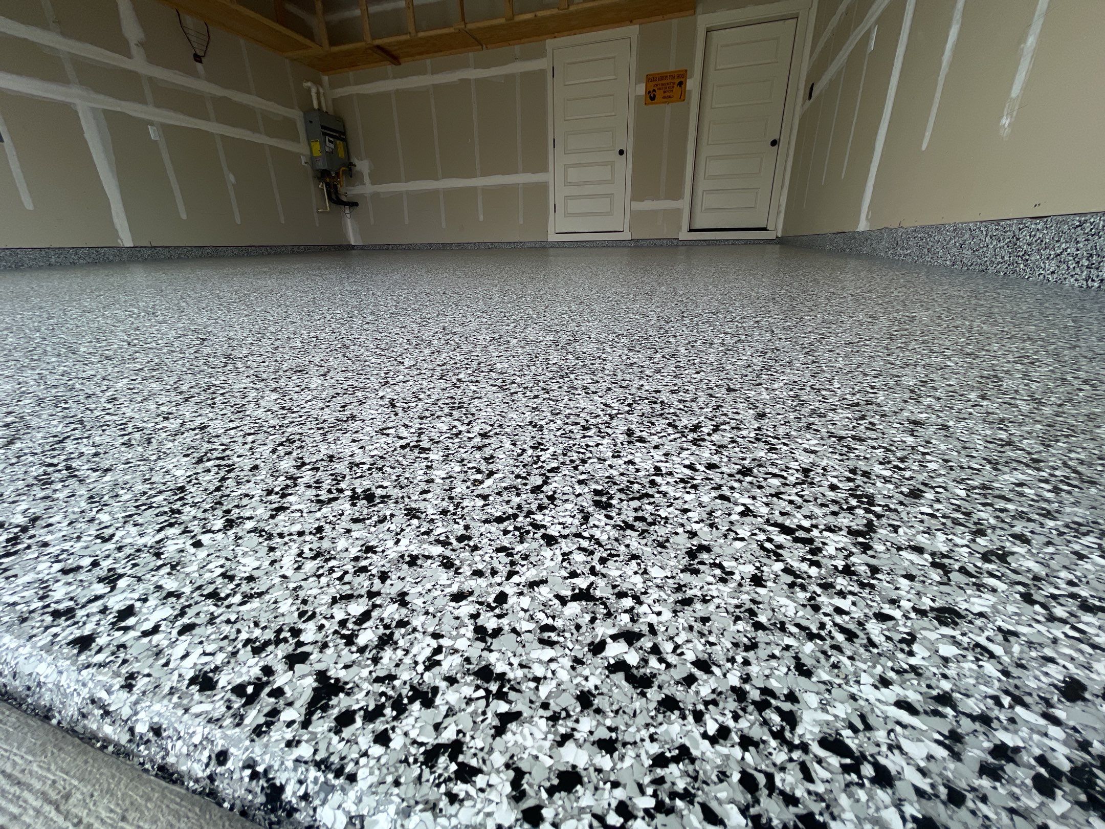 Garage Transformation using Domino by Croc Coatings, LLC