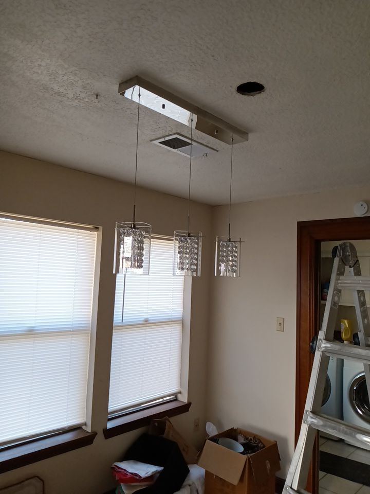 Interior and exterior painting project by Roof Concepts Construction