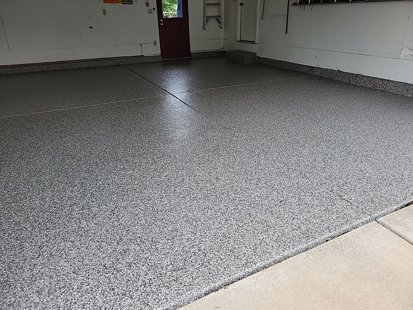 Garage and Porch Coating in Osceola by Innovative Spaces / Innovative Concrete Coatings