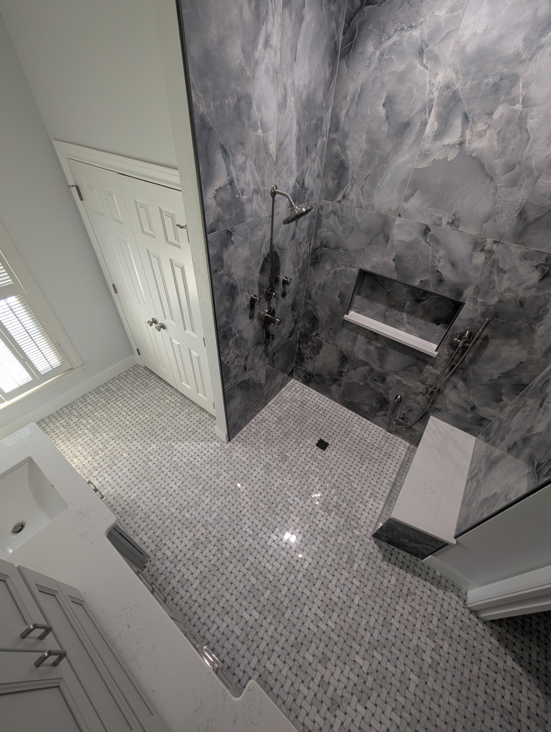 Walker Ranch Bathroom Remodel with Expanded Walk-In Shower and Custom Storage by Legacy Bath and Kitchen