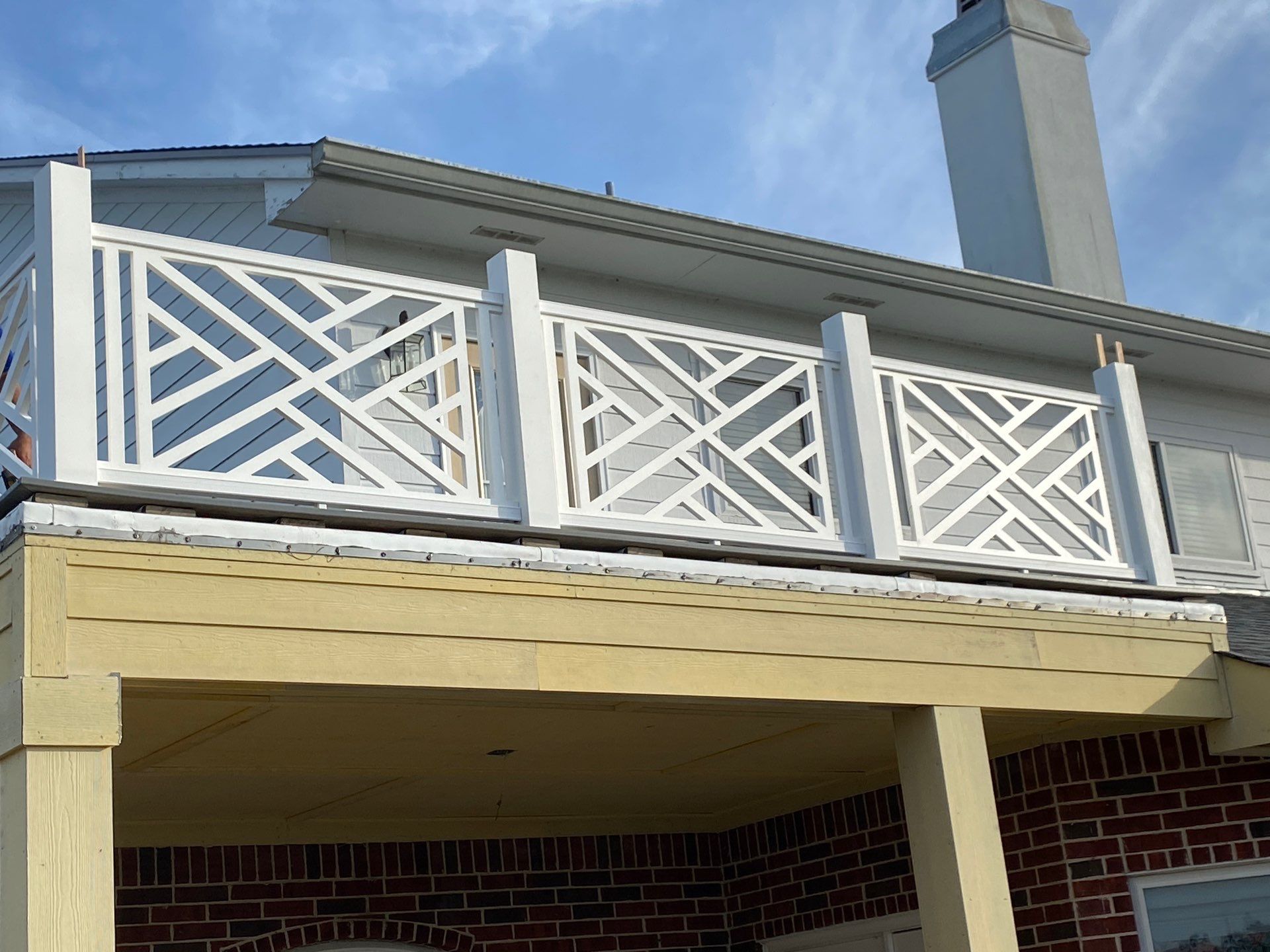 Chippendale Railings by Bayfront Roofing and Construction