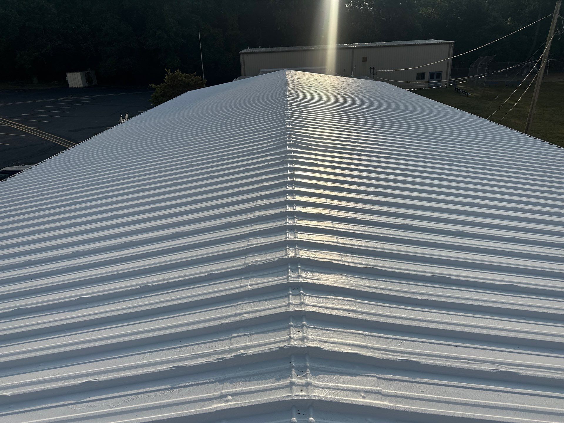 Commercial Roofing Install - Metal Coatings Restoration System  - Color White  by Titan Commercial & Residential Roofing 