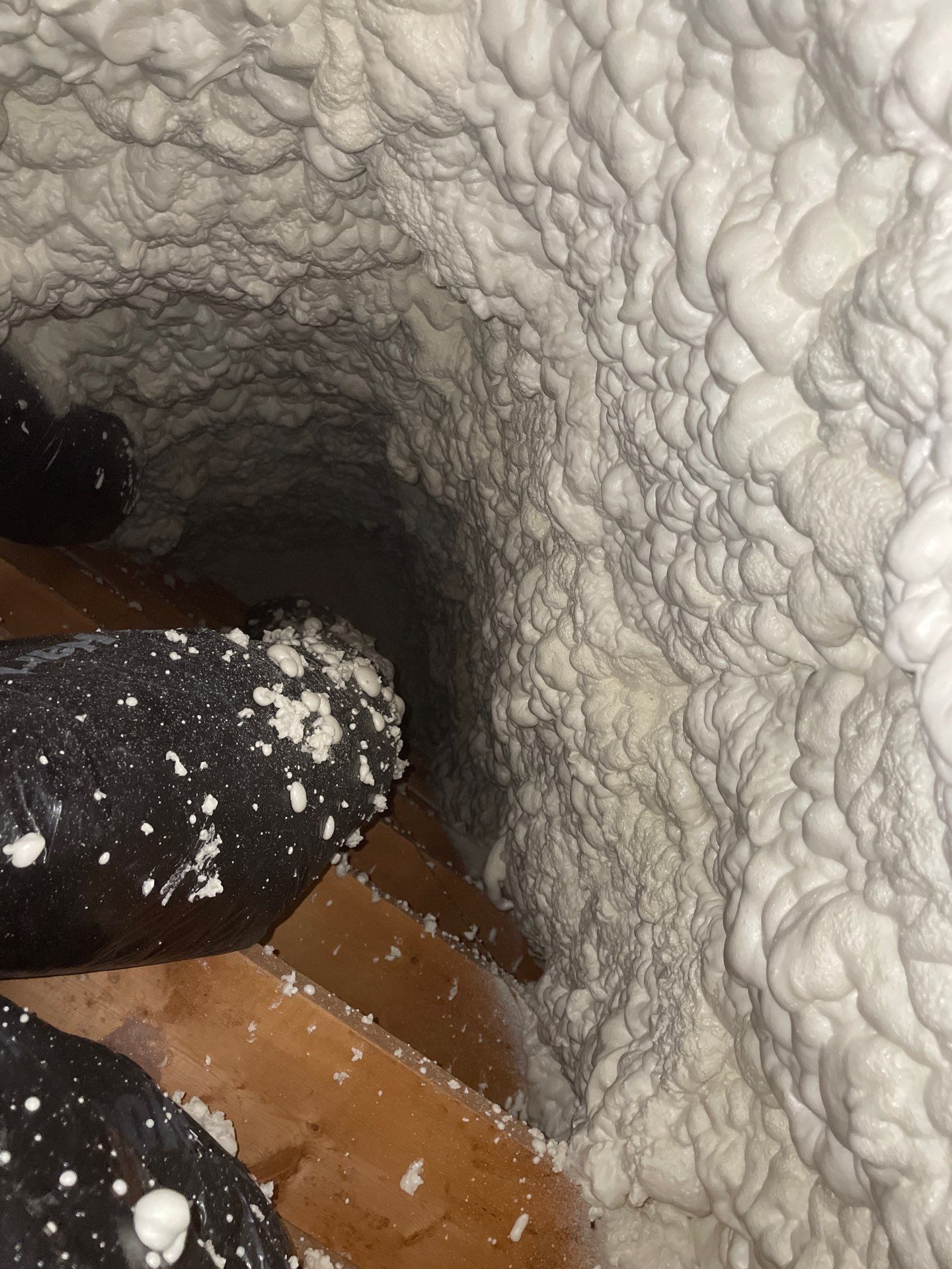 Attic Insulation using open cell spray foam by NYS Foam & Energy